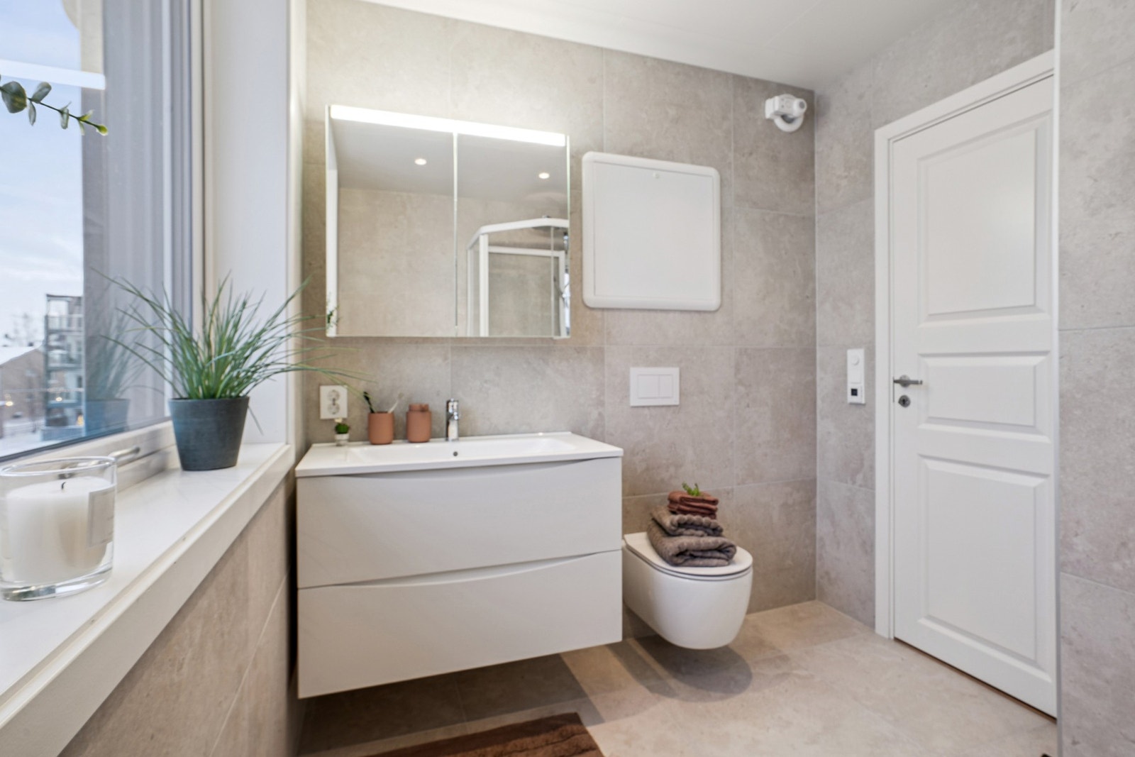 Elektriske varmekabler på badet. Galleribilde