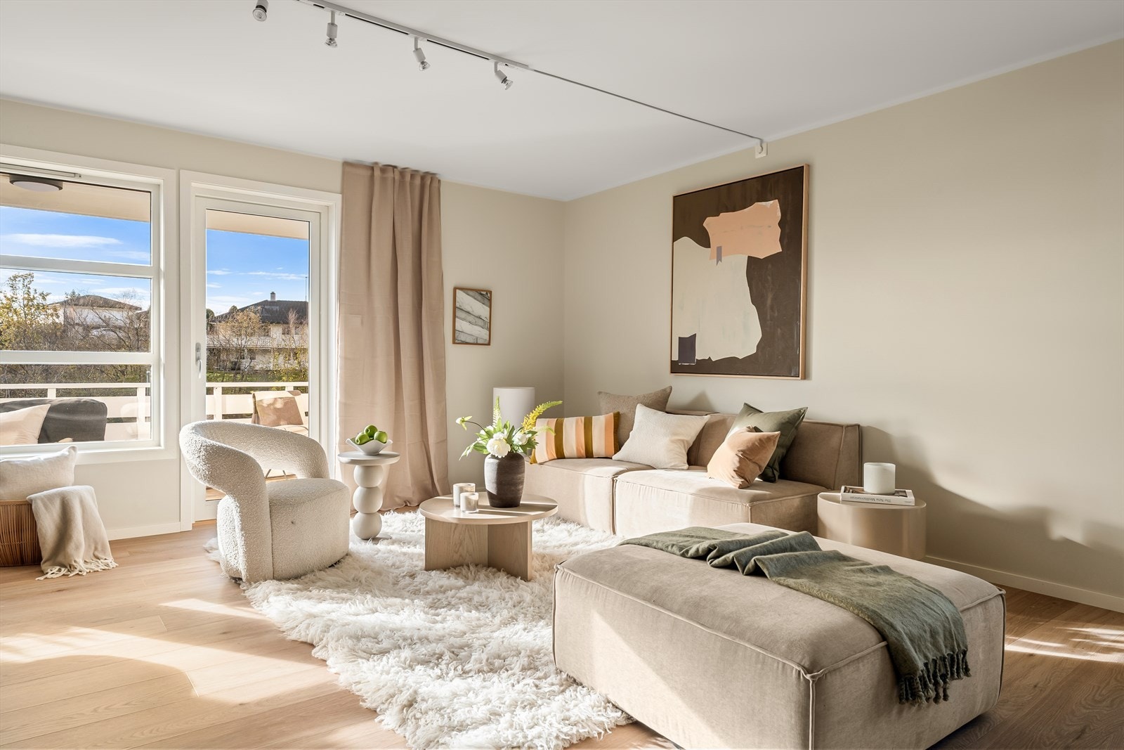 Lys og innbydende stue. Galleribilde