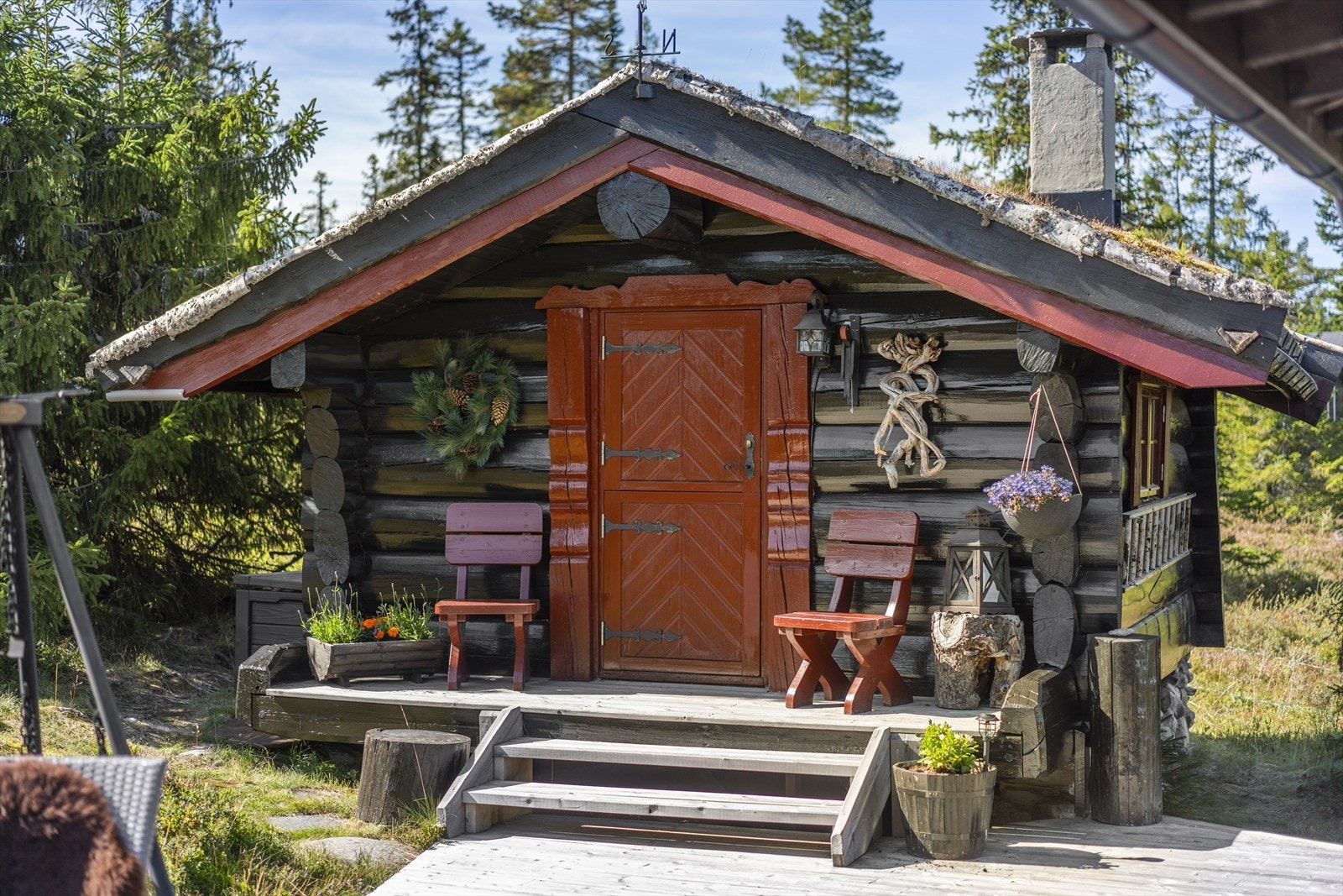 Annekset er i laftet tømmer. Galleribilde