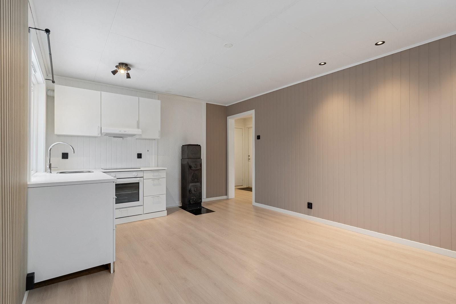 Vedovn i stuen gir effektiv oppvarming. Galleribilde