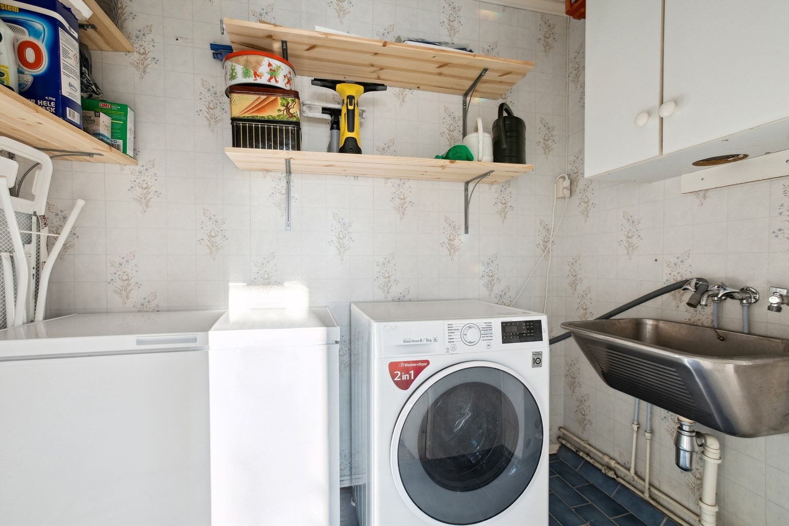 Leiligheten har et praktisk vaskerom. Galleribilde