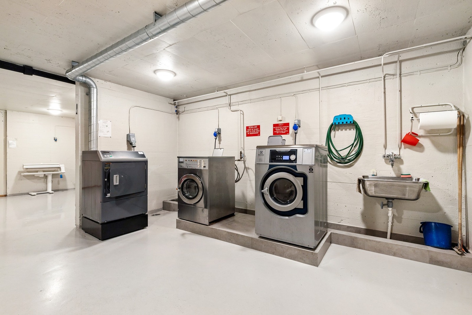 Felles vaskerom om en ikke ønsket å ha vaskemaskin på badet Galleribilde