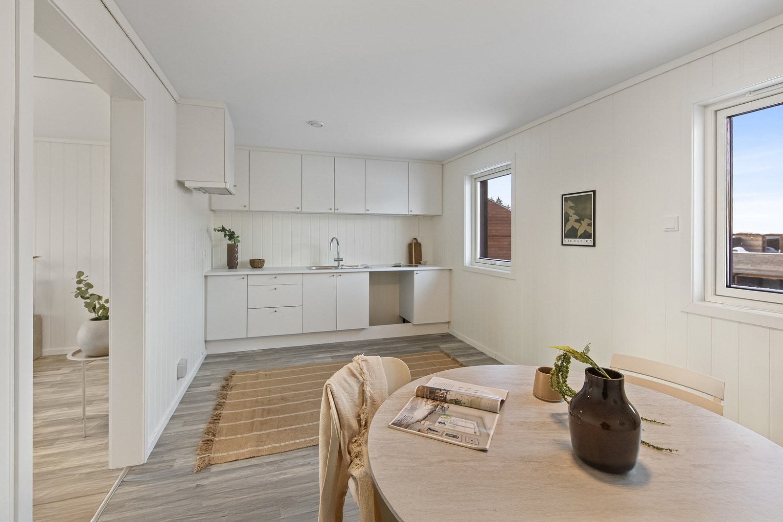 På kjøkkenet er det plass til et koselig spiseområde for måltider med familien Galleribilde