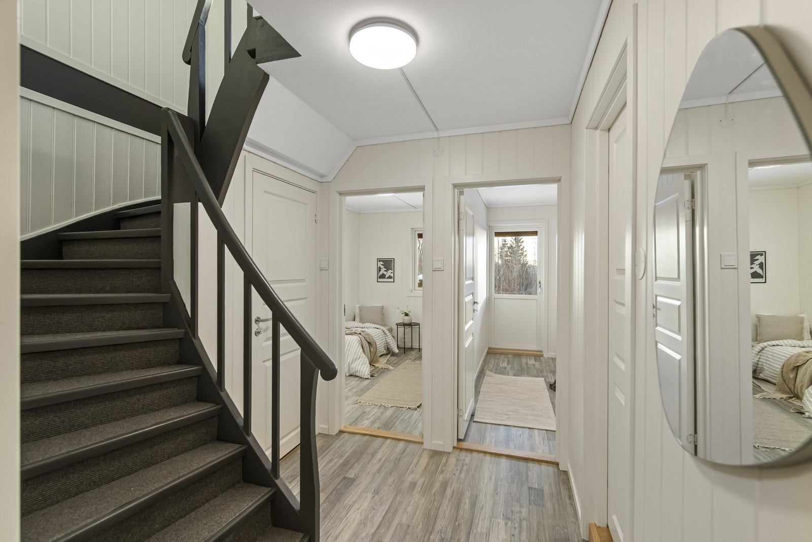 Videre i etasjen finner du flere soverom Galleribilde