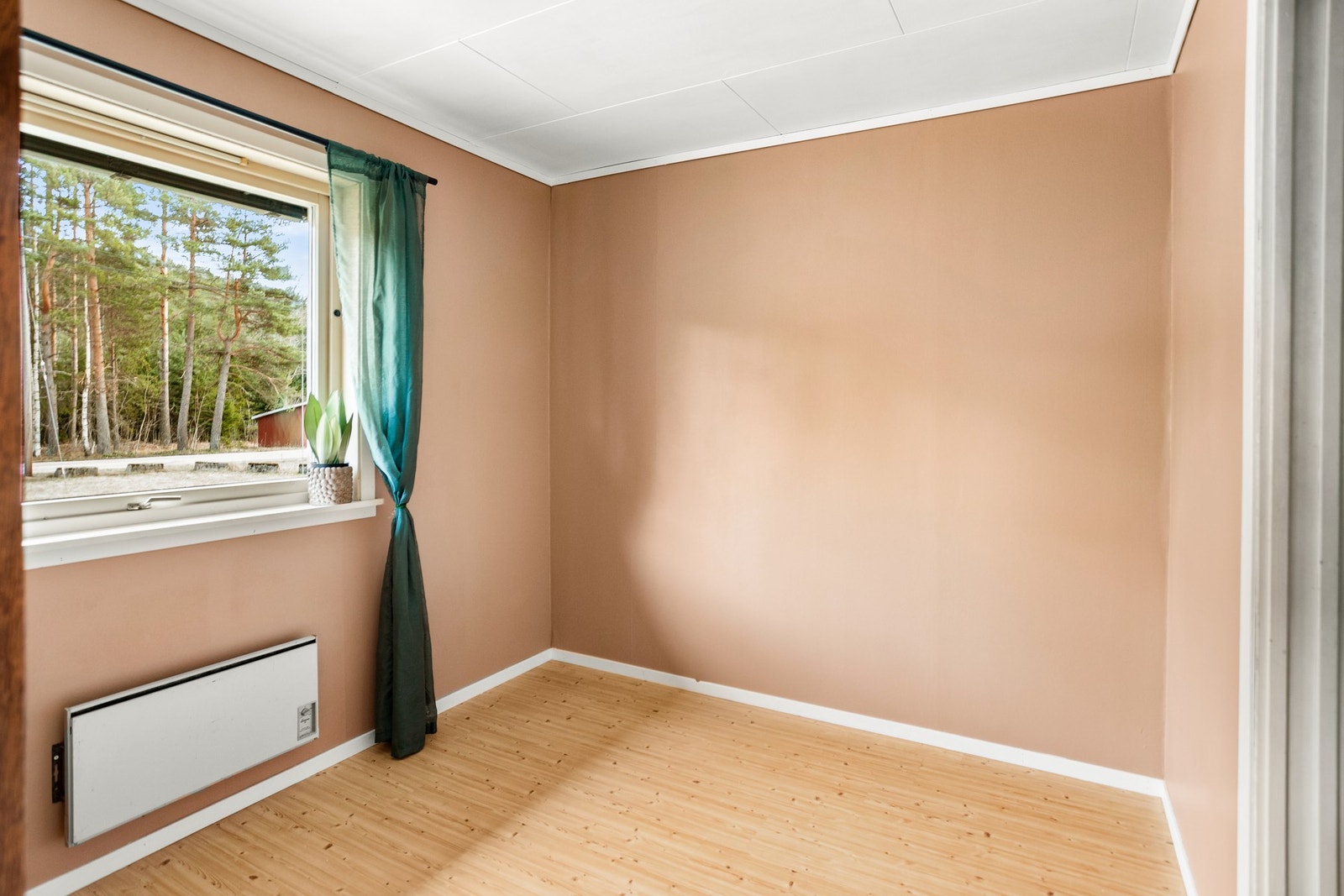 Avsatt plass til spisegruppe på kjøkkenet. Galleribilde