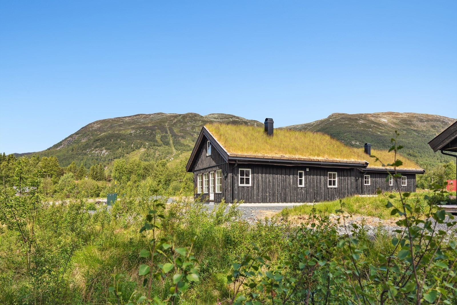 Hyttene er arealeffektive og har lyse, åpne stuer. Galleribilde