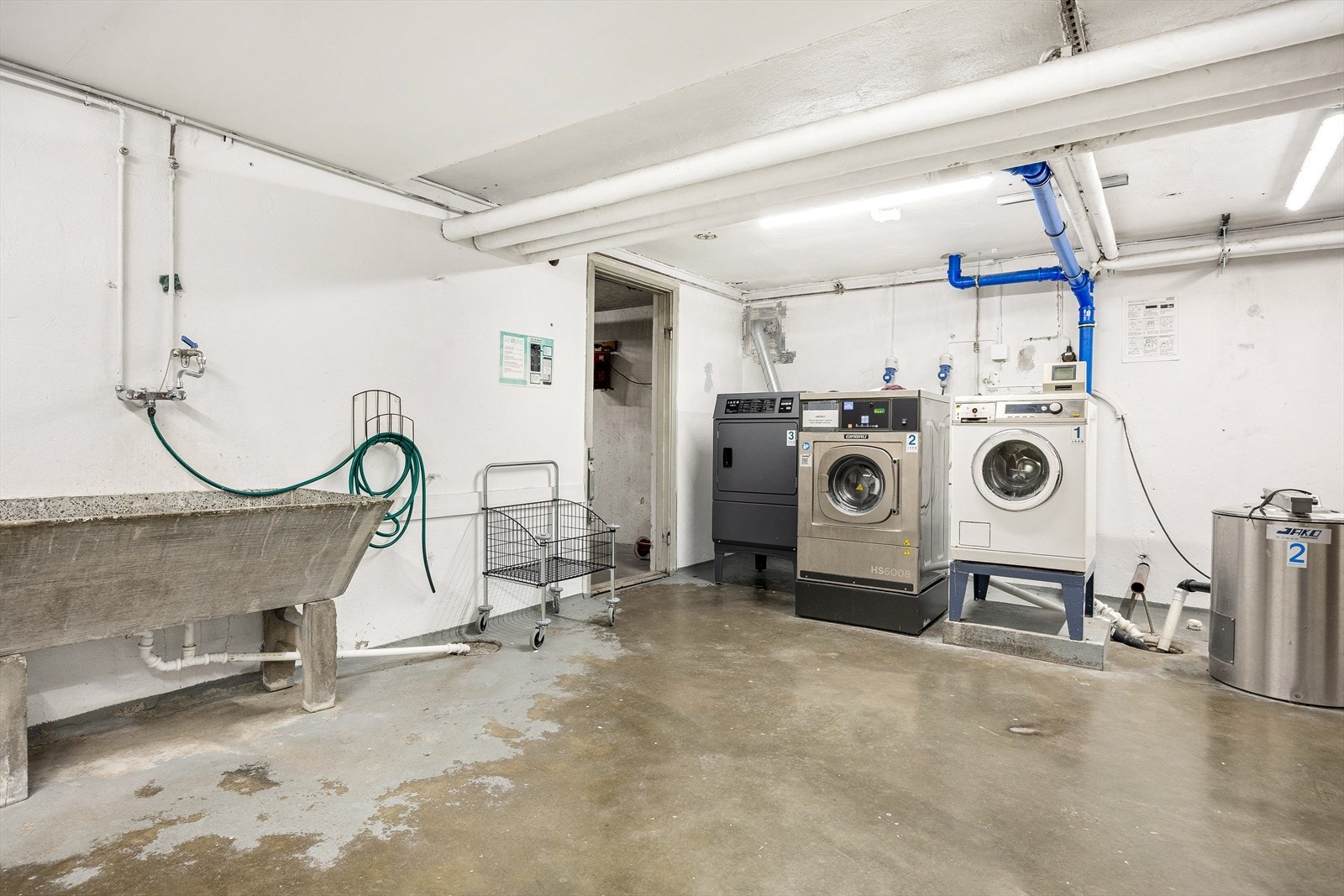 Sameiet har et fellesvaskeri tilgjengelig for beboerne Galleribilde