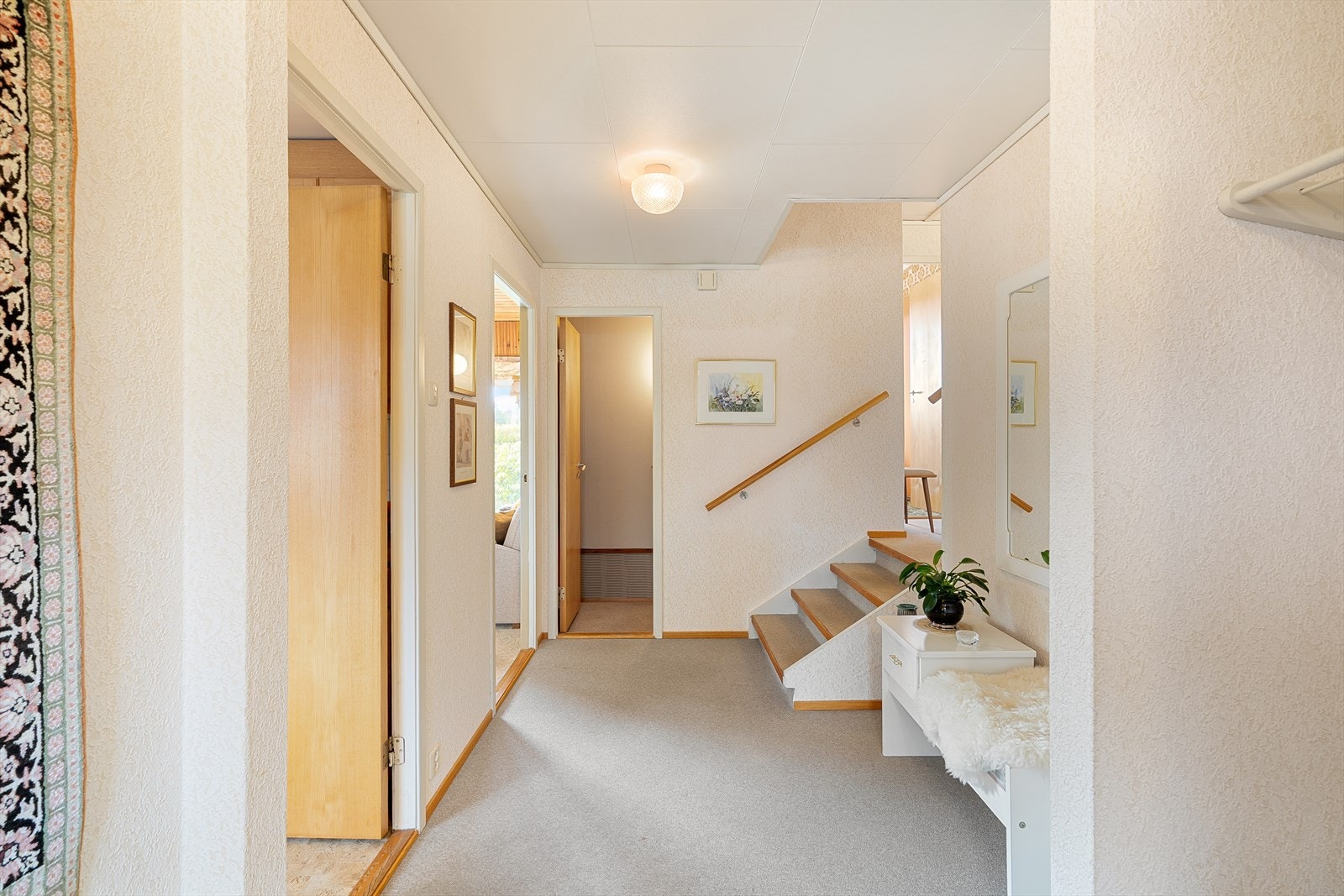 Går en opp de få trinnene til neste platå finner en tre soverom og bad. Galleribilde