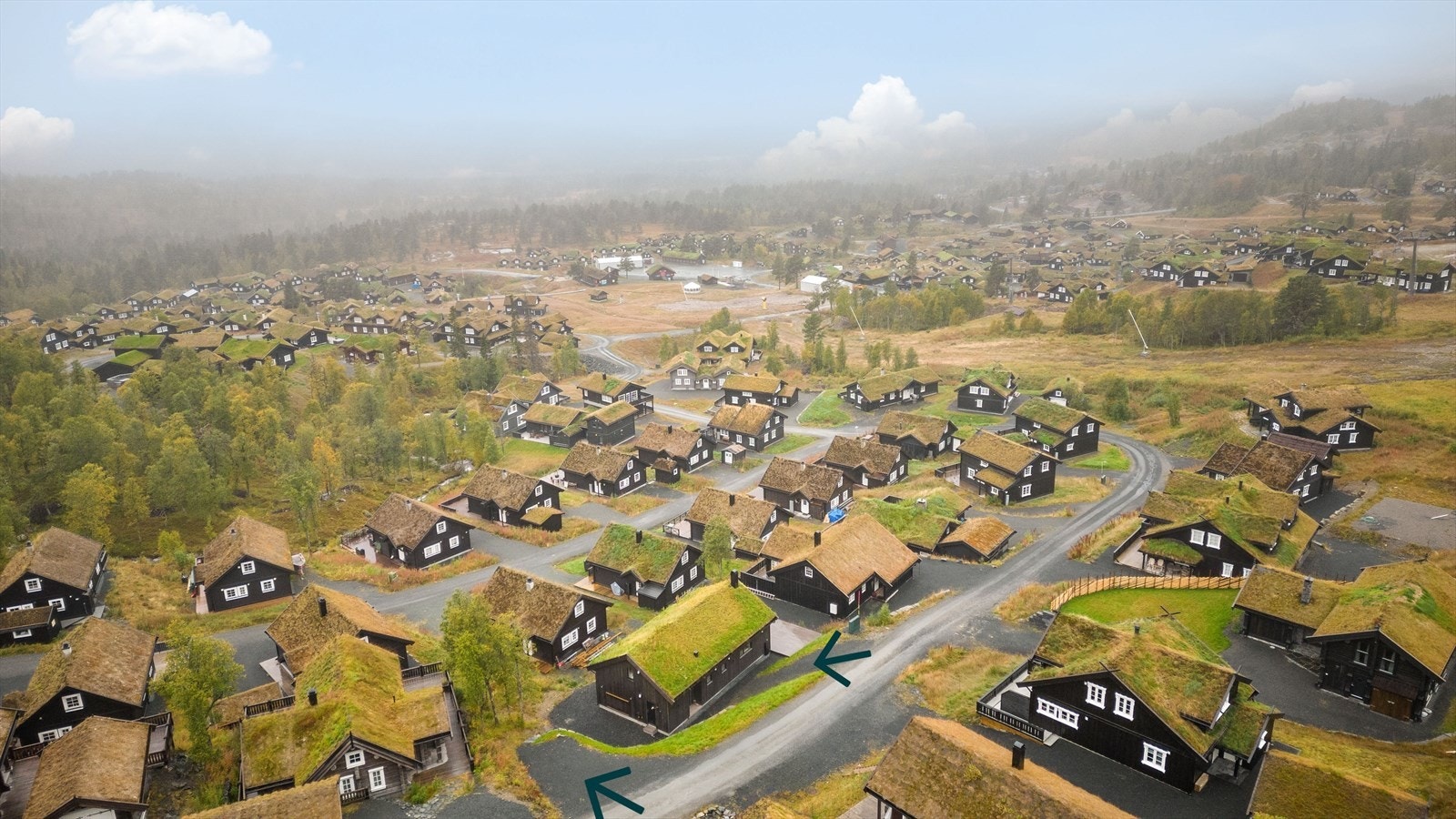 Parkeringsmuligheter i gruset gårdsplass Galleribilde