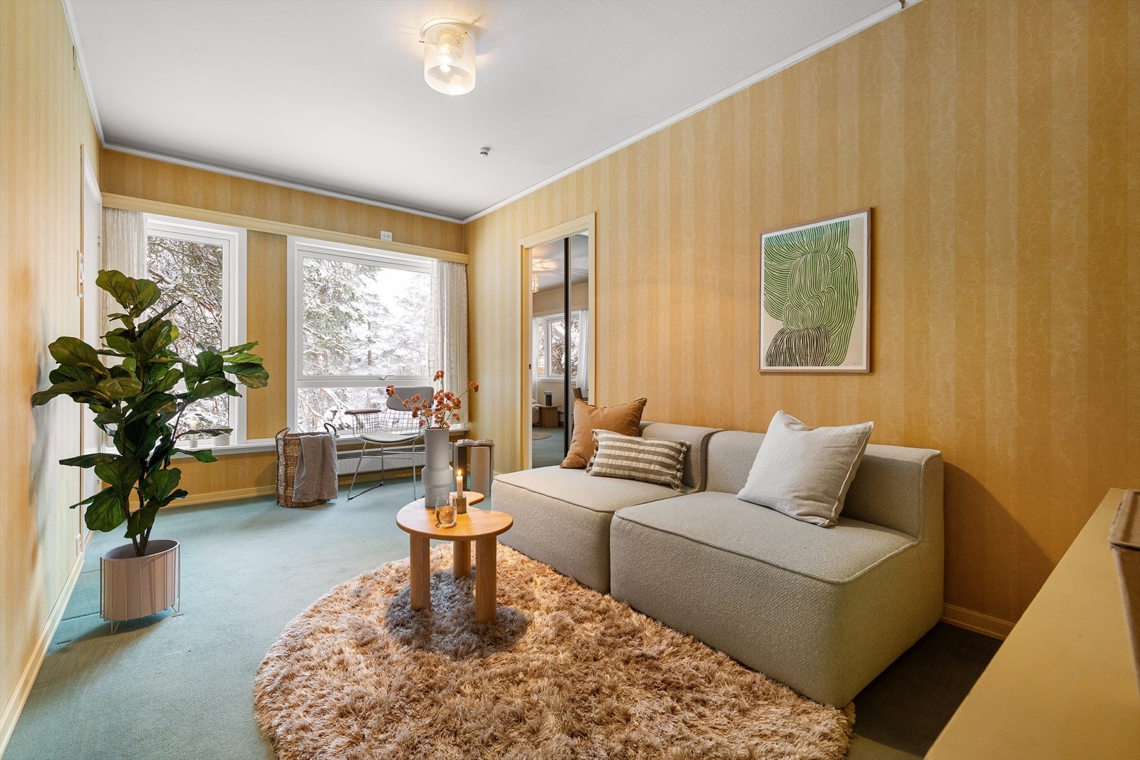 Leiligheten er også en hyggelig tv-stue/bibilotek, eller en privat stue til barna. Galleribilde