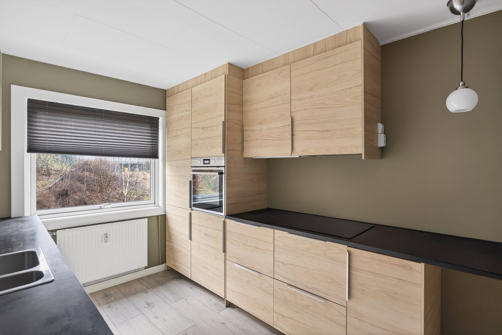 Integrerte hvitevarer gir et helhetlig og ryddig uttrykk på kjøkkenet Galleribilde