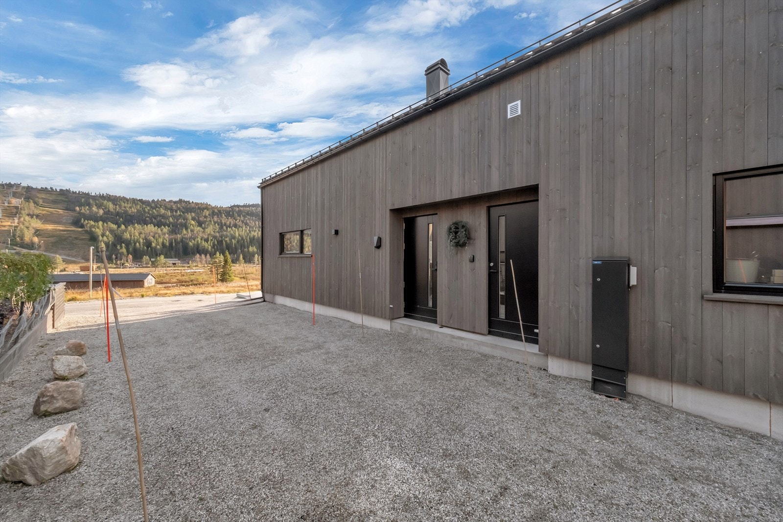 God plass til parkering på tomten Galleribilde