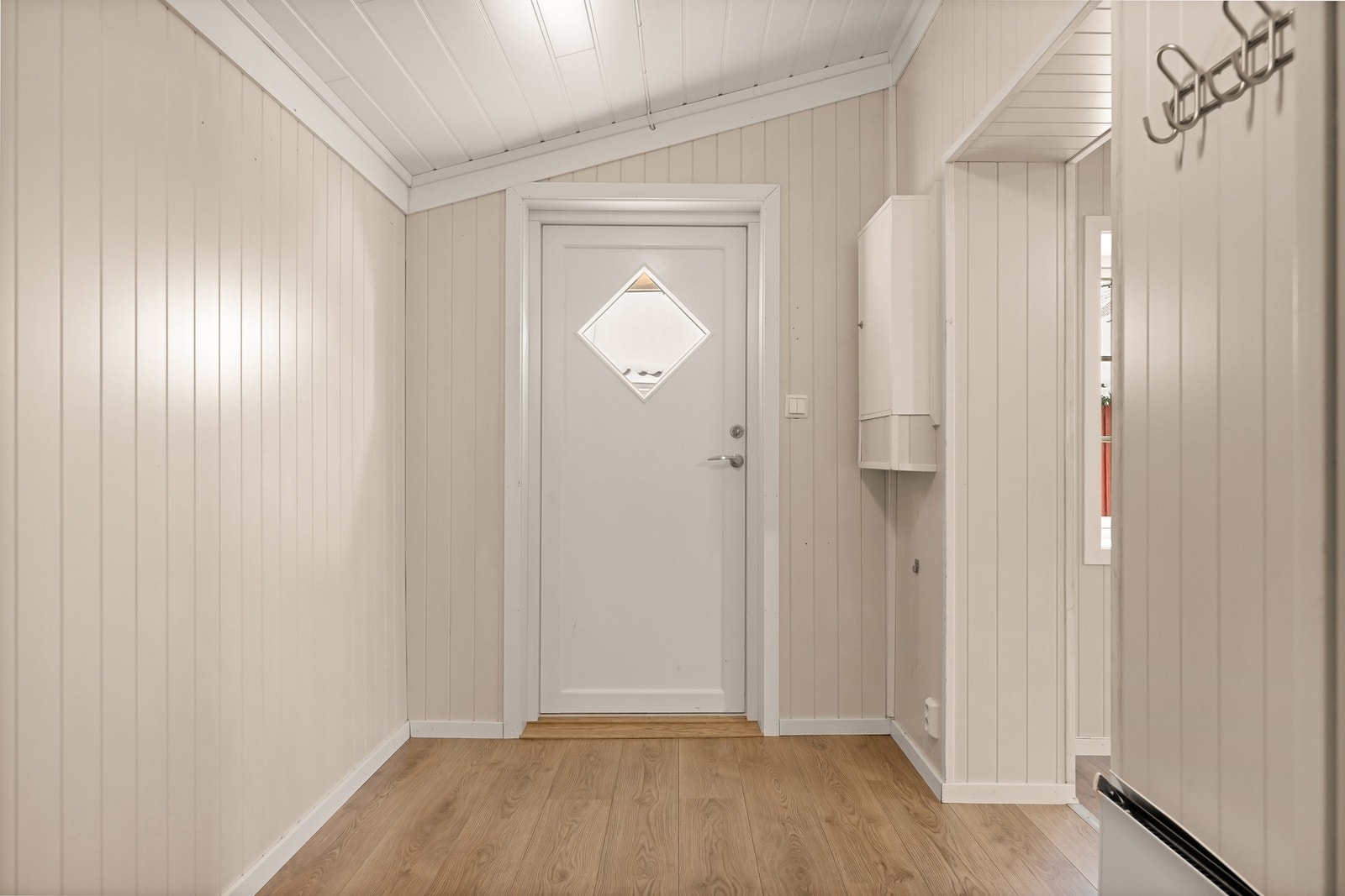 En lys og romslig entré ønsker velkommen inn Galleribilde