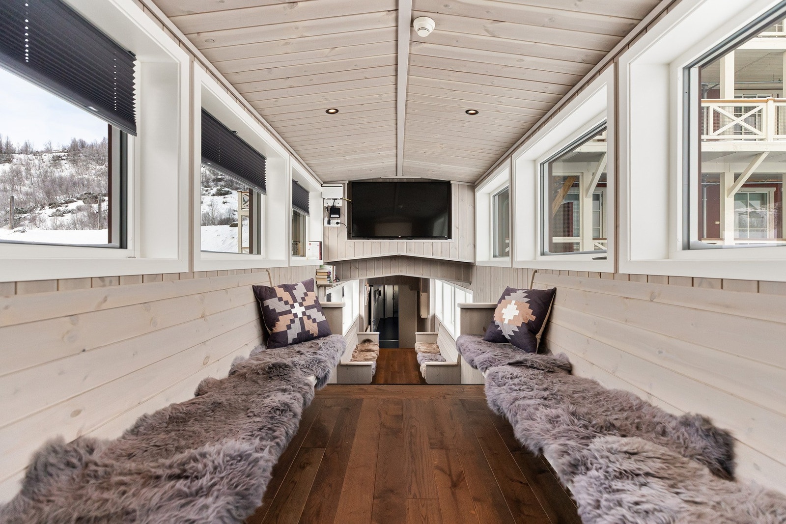 Sameiet har også innendørs fellesarealer med hyggelige sittearealer i buegangen mellom hovedbygningen og annekset Galleribilde