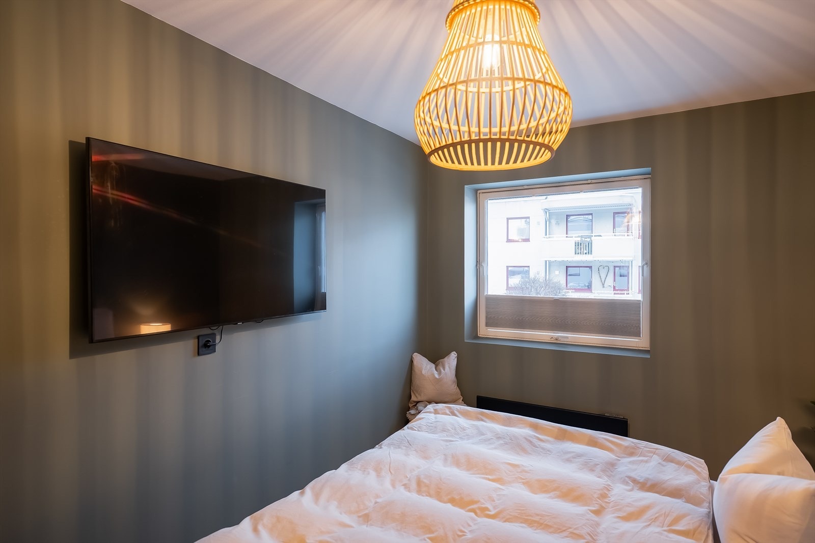 Soverommet er malt med behagelige fargetoner. Galleribilde