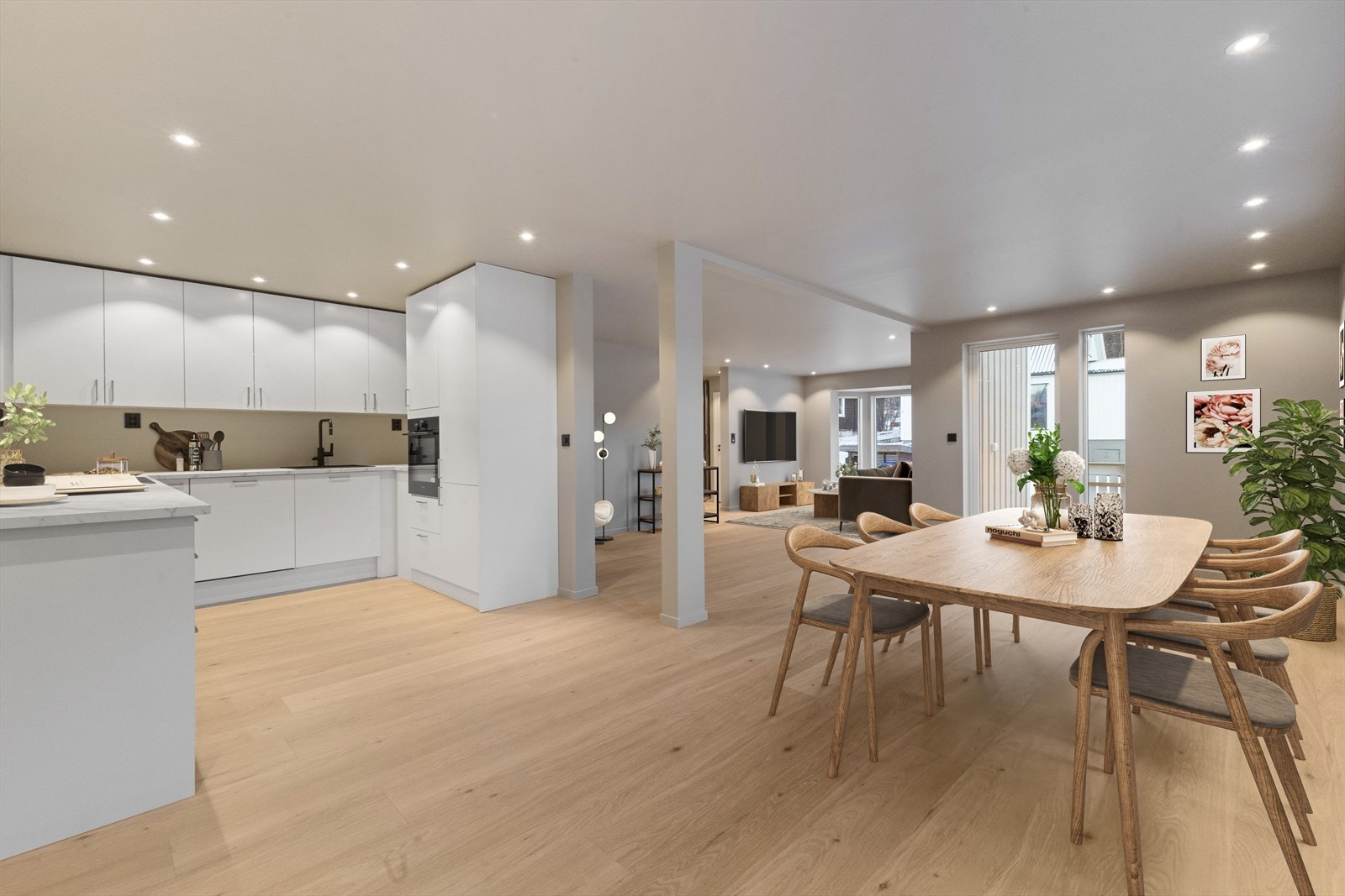 Fantastisk fint og åpent areal, der kjøkkenet likefullt er plassert litt i skjul for å begrense støy/lyd mellom sonene. Galleribilde