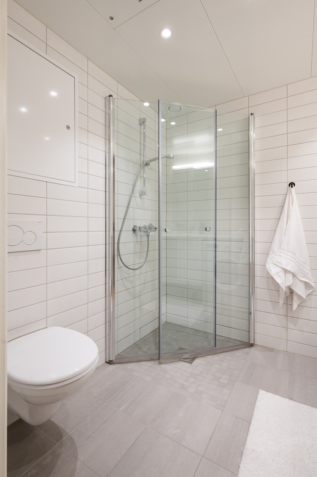 Det er lagt vannbåren varme i baderomsgulvet. Galleribilde