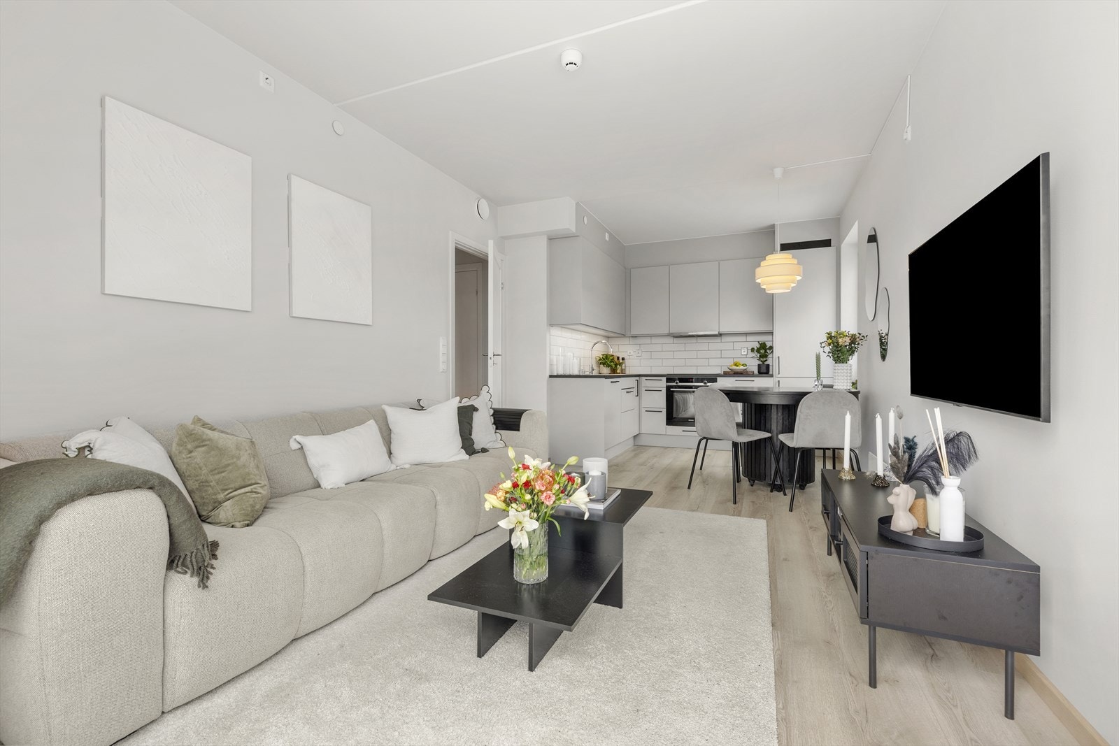 Her får man et godt inntrykk av den åpne og sosiale sonen i leiligheten. Galleribilde