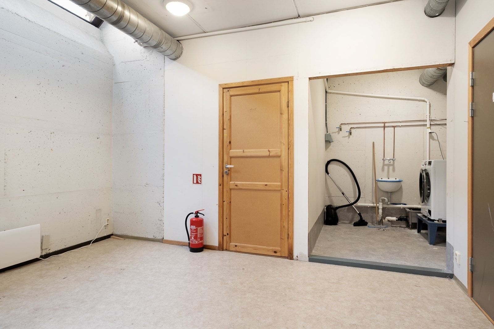 Felles vaskerom i kjellar for alle seksjonane. Galleribilde