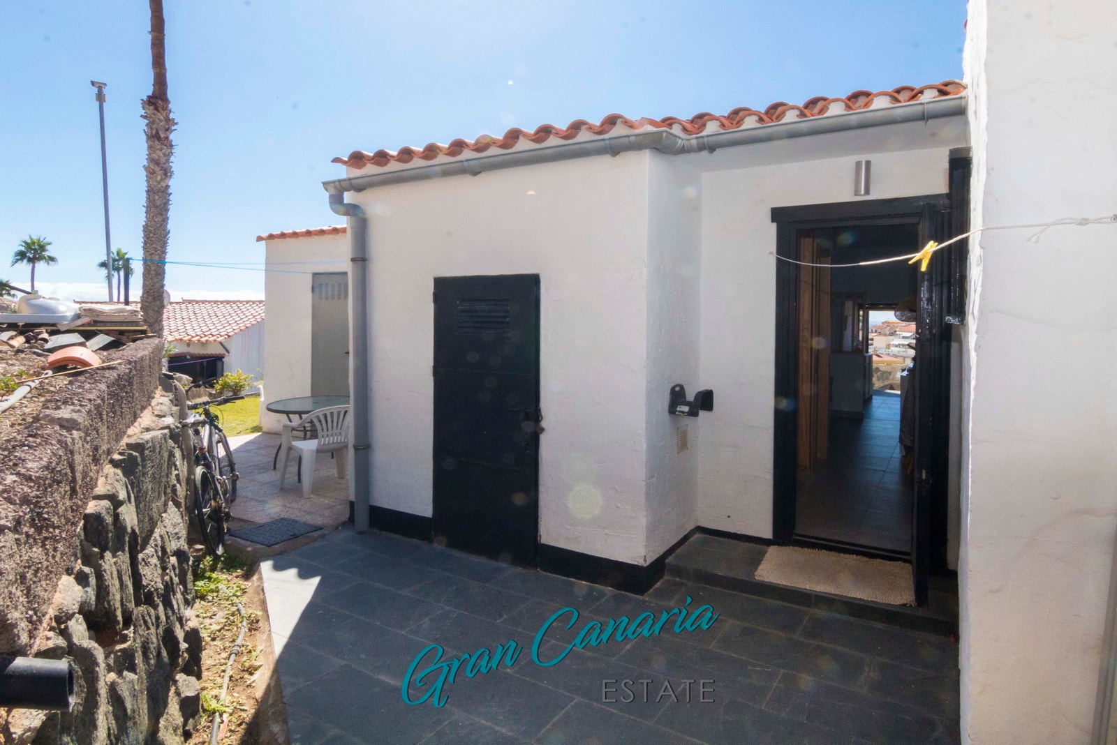 Terrasse bak Galleribilde