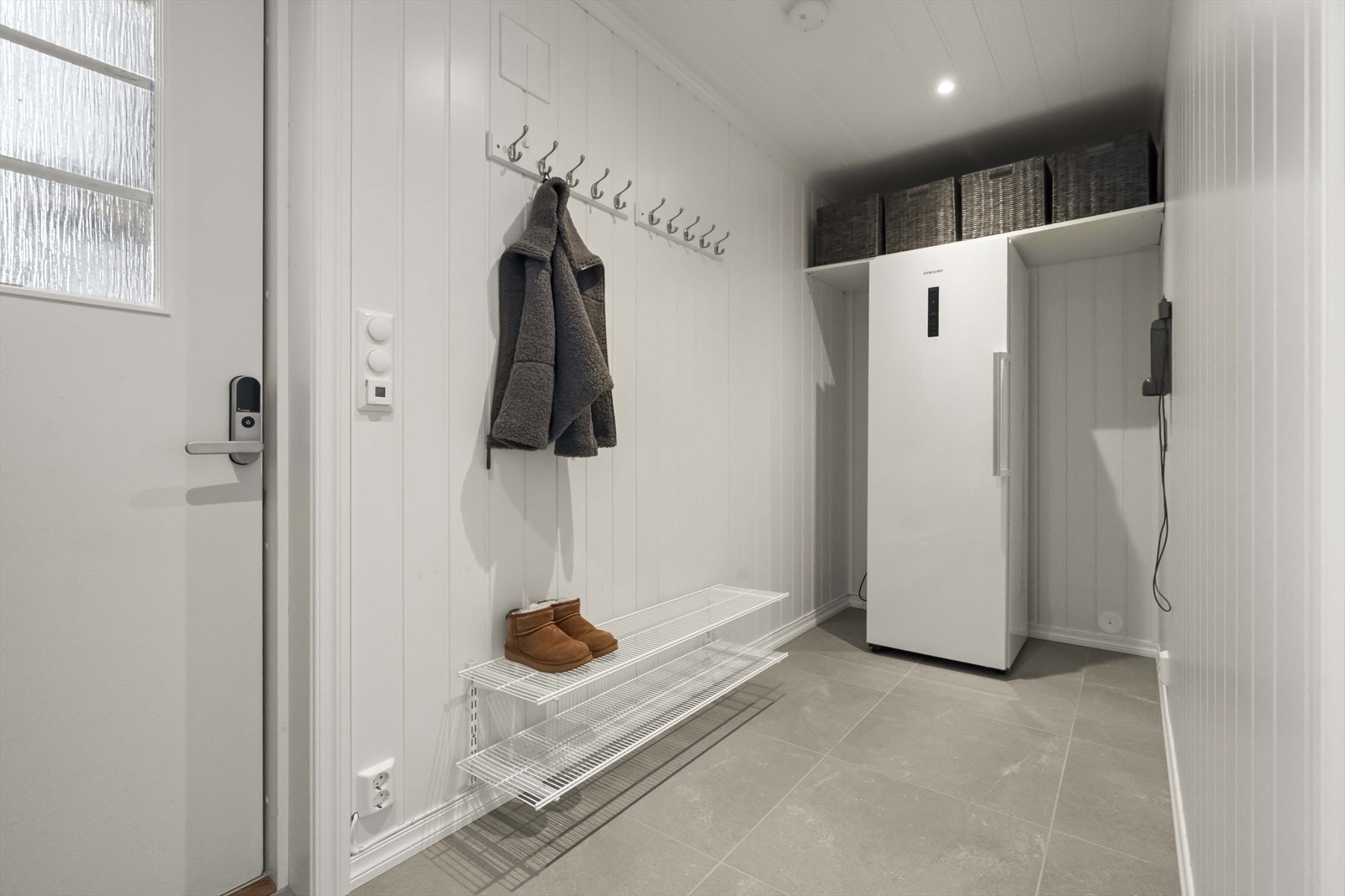 - Praktisk grovinngang fra garasje med god plass til garderobeskap - ideelt for en aktiv hverdag. - Galleribilde