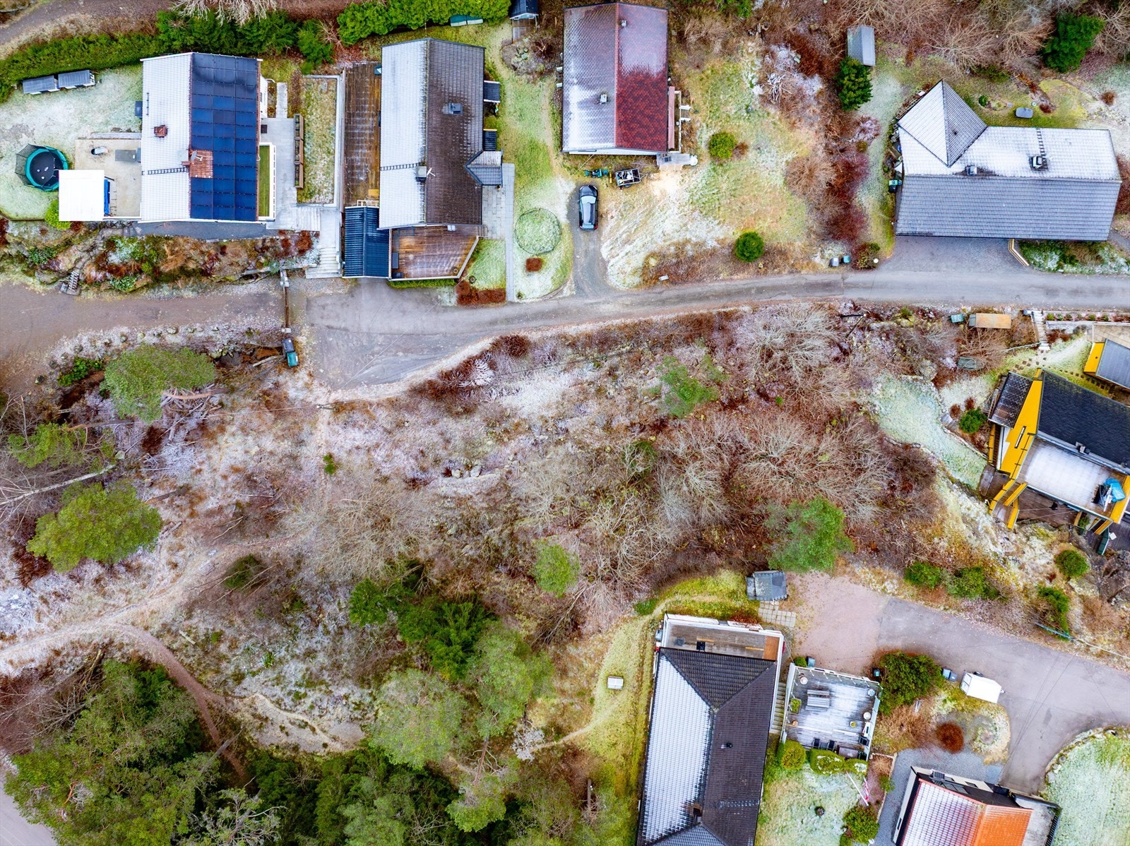 Oversiktsbilde over tomten og nærliggende bebyggelse. Galleribilde