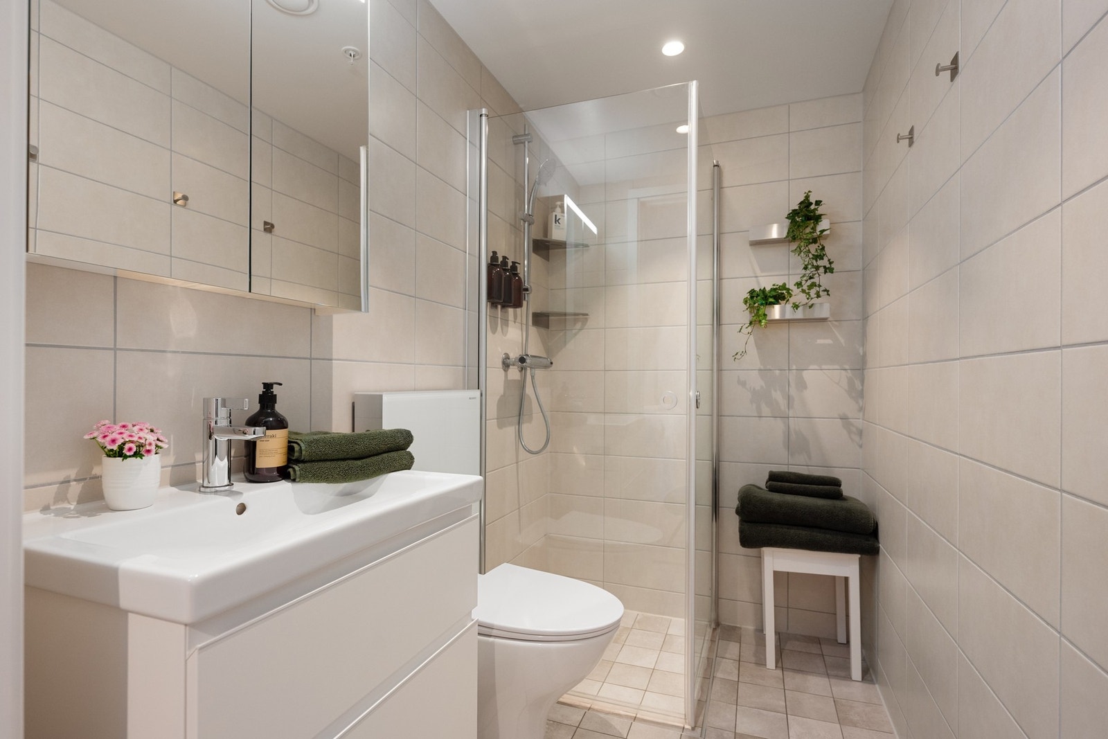 Tiltalende bad med gulvvarme Galleribilde