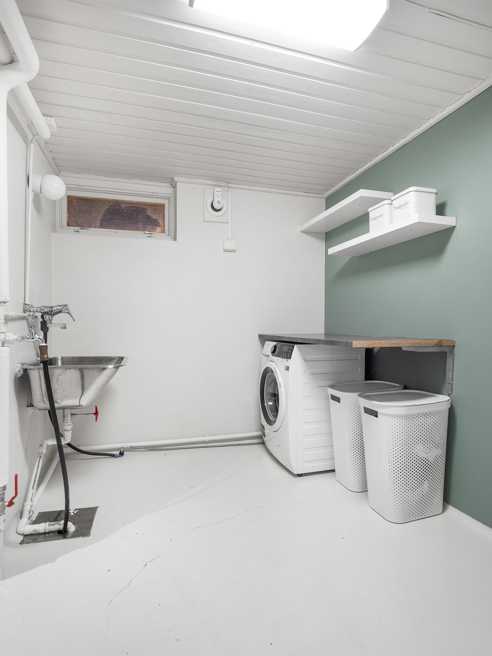 Det er opplegg for vaskemaskin på vaskerommet Galleribilde