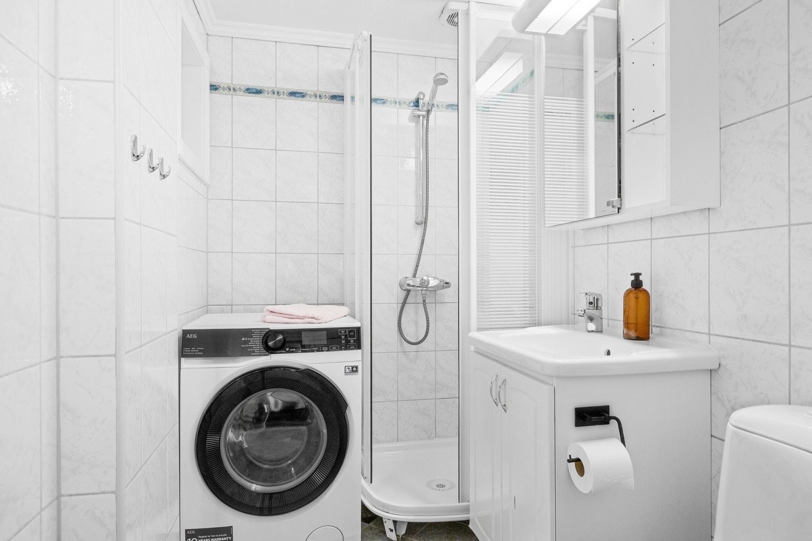 Opplegg til vaskemaskin på badet Galleribilde