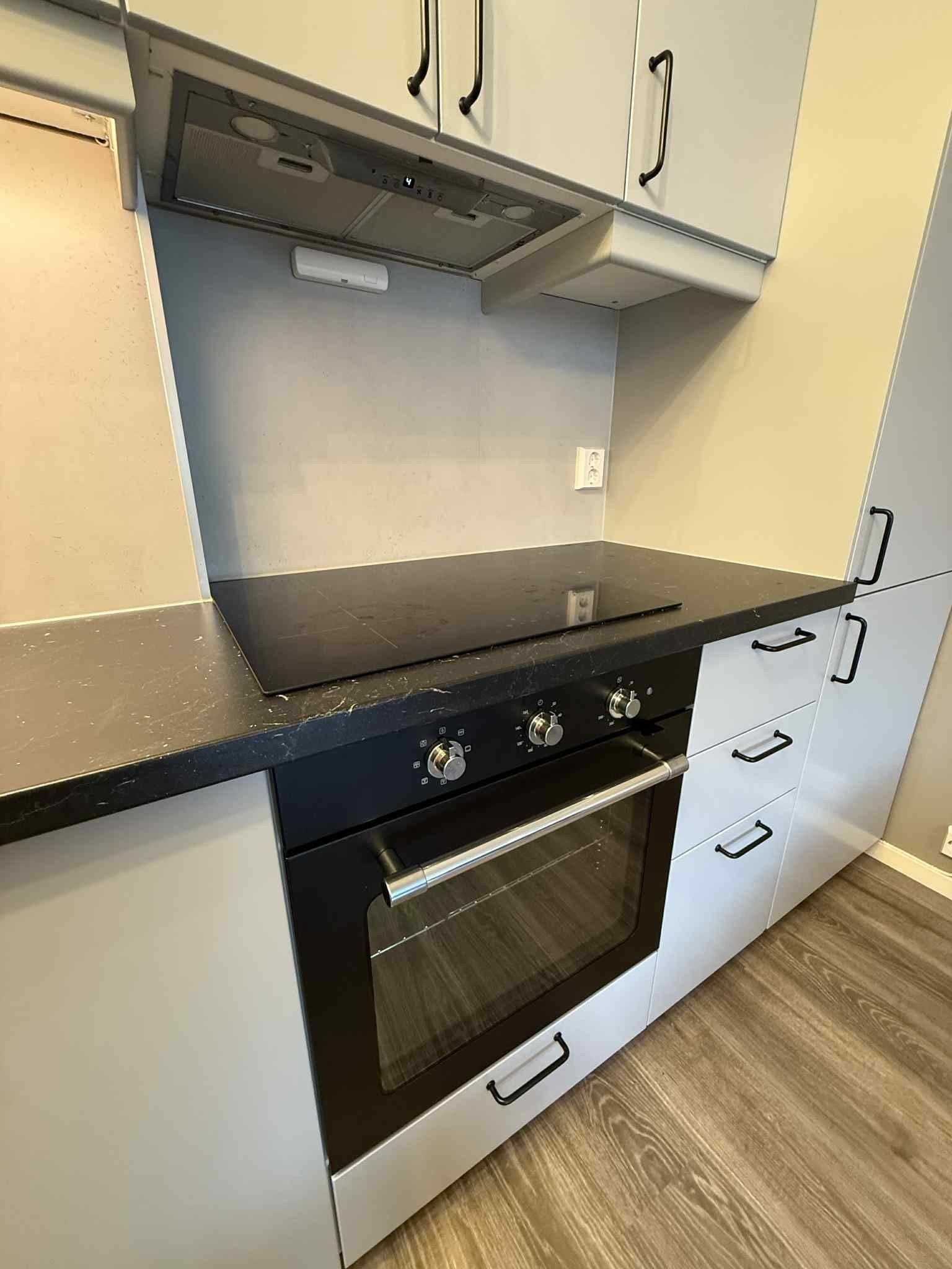 Kjøkken med spesialbestilt avtrekk. Galleribilde