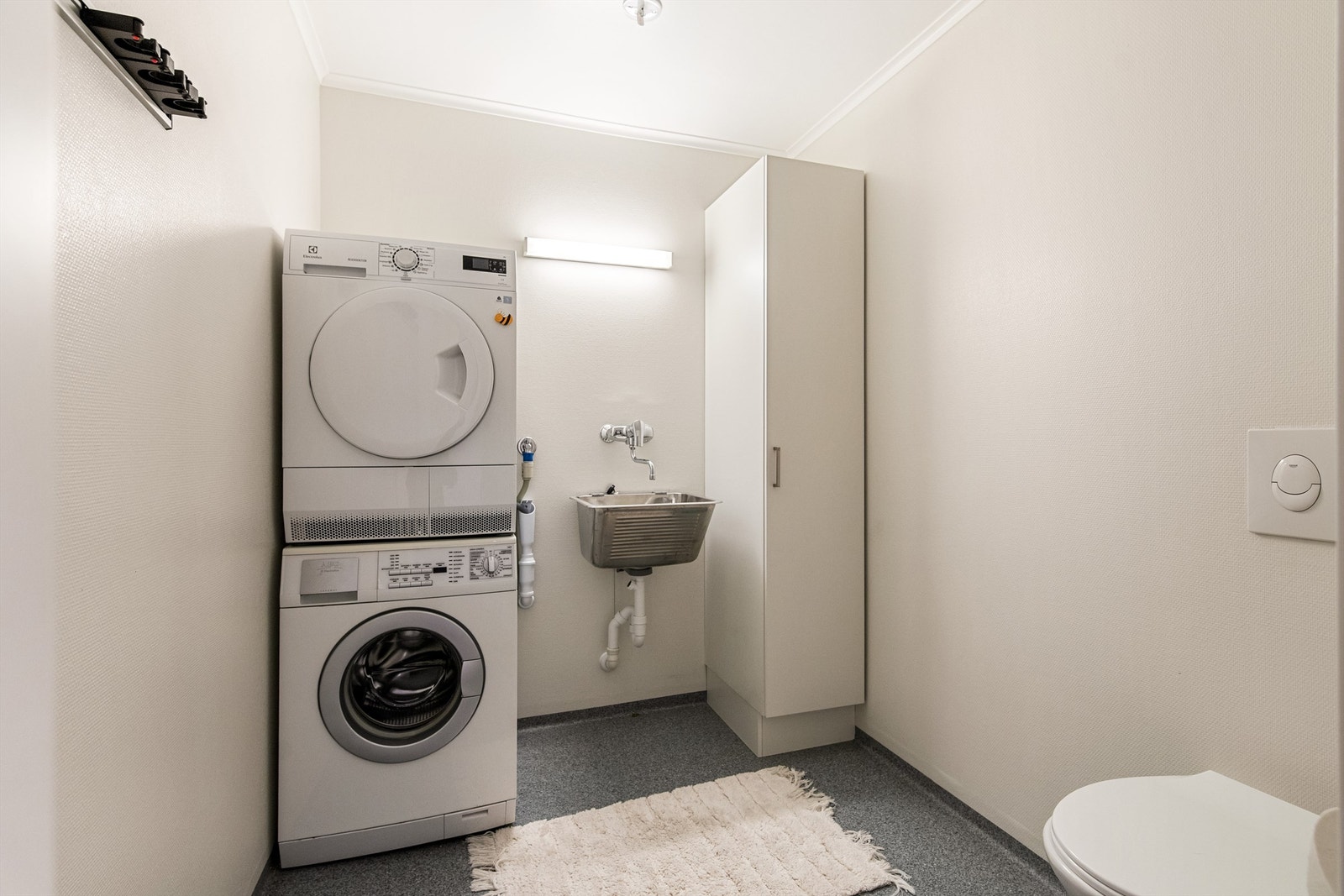 Vaskerom med ekstra toalett er en praktisk løsning Galleribilde