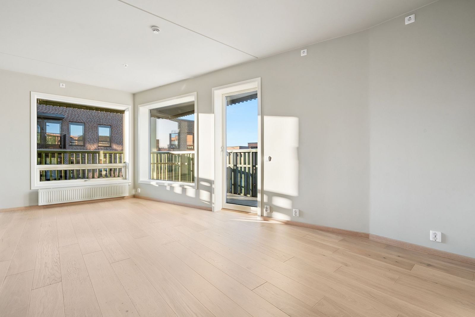 Stue med åpen og sosial planløsning. Galleribilde