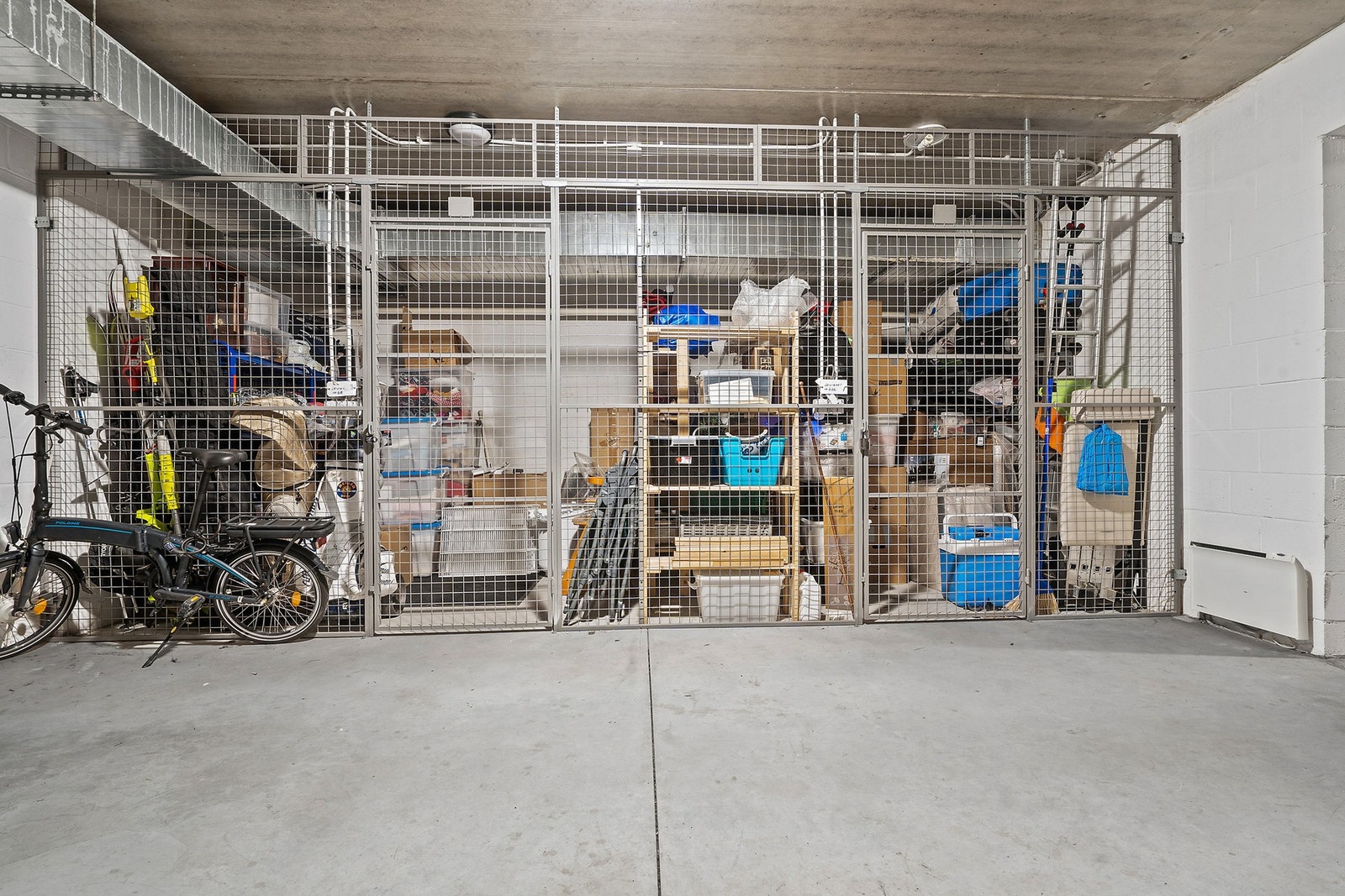 Bodplass i nettingbod i felles bodkjeller Galleribilde