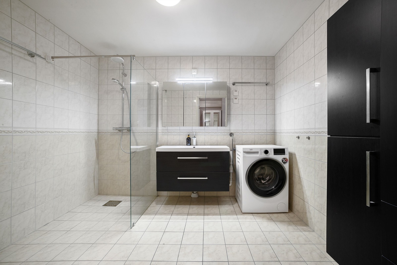 Flislagt bad med gulvvarme Galleribilde