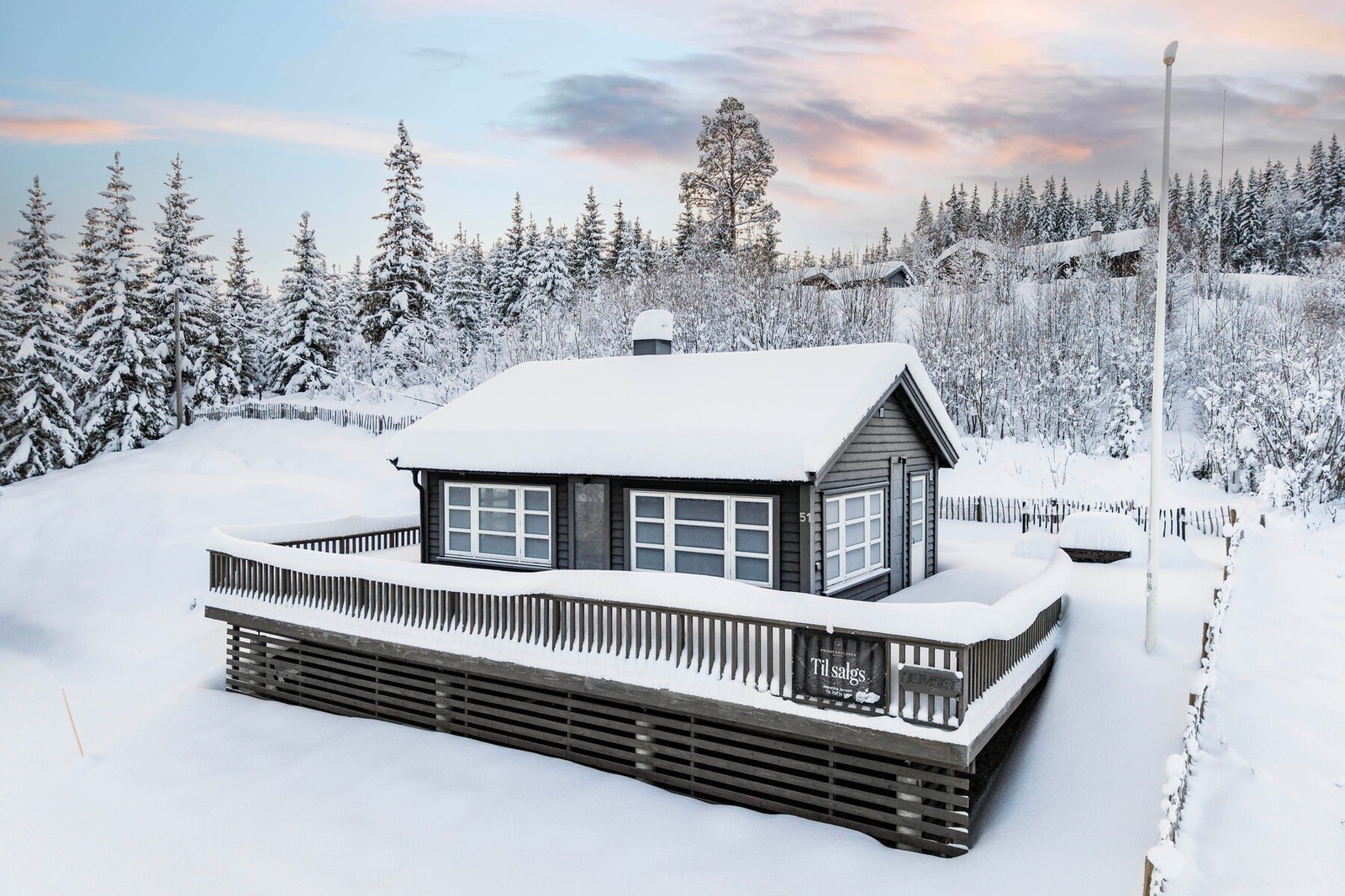 Nyt solrike dager på verandaen. Galleribilde