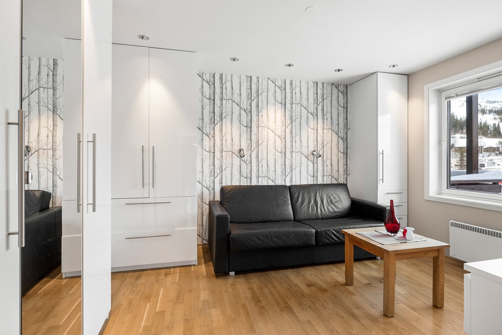 Spotter i himlingen setter en lun og fin stemning i leiligheten Galleribilde