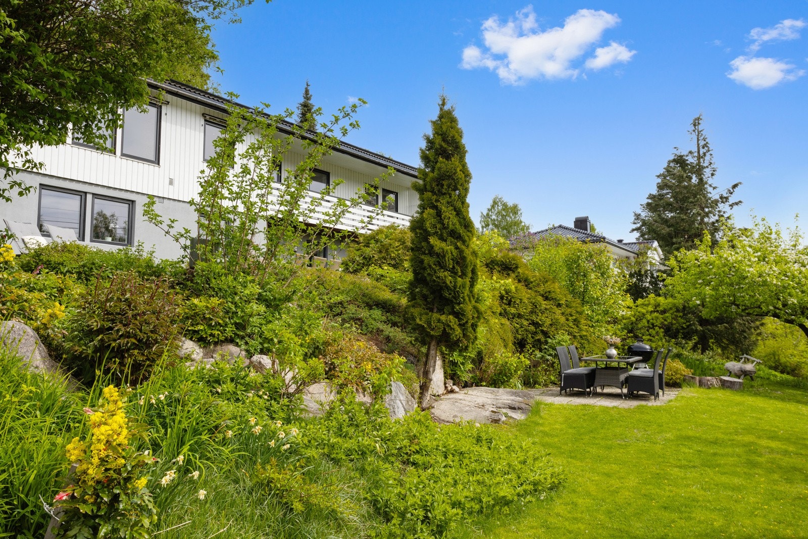 Variert beplantning er brukt for å skape soner for opphold og rekreasjon Galleribilde