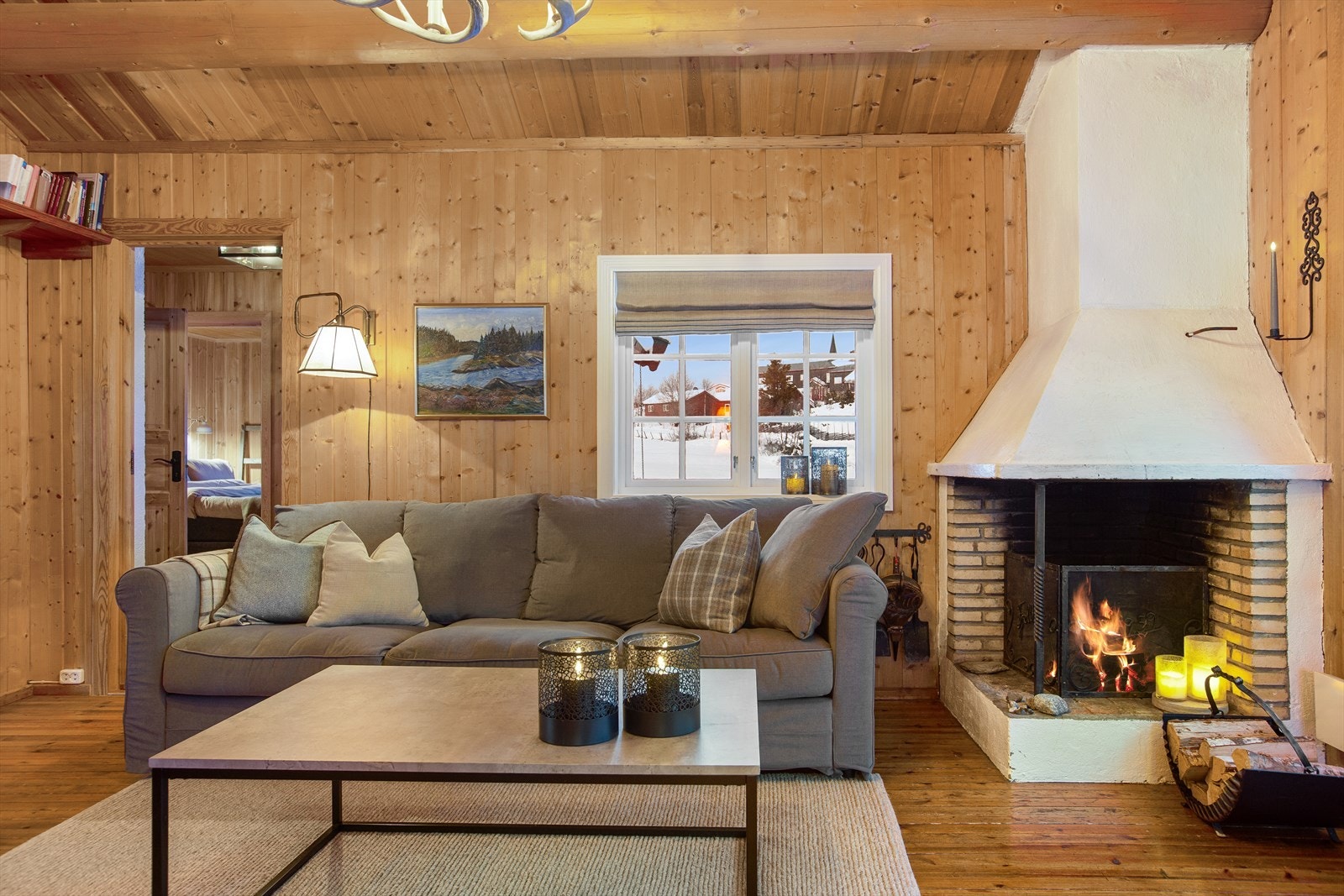 Sofakroken bærer preg av lunhet, og innbyr til avkobling og hyggelige stunder. Galleribilde