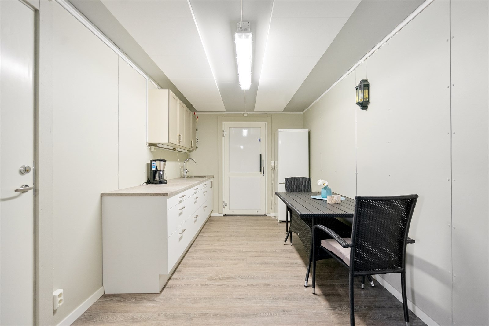 Fellesareal med møterom og kjøkken i samme etasje som leiligheten Galleribilde