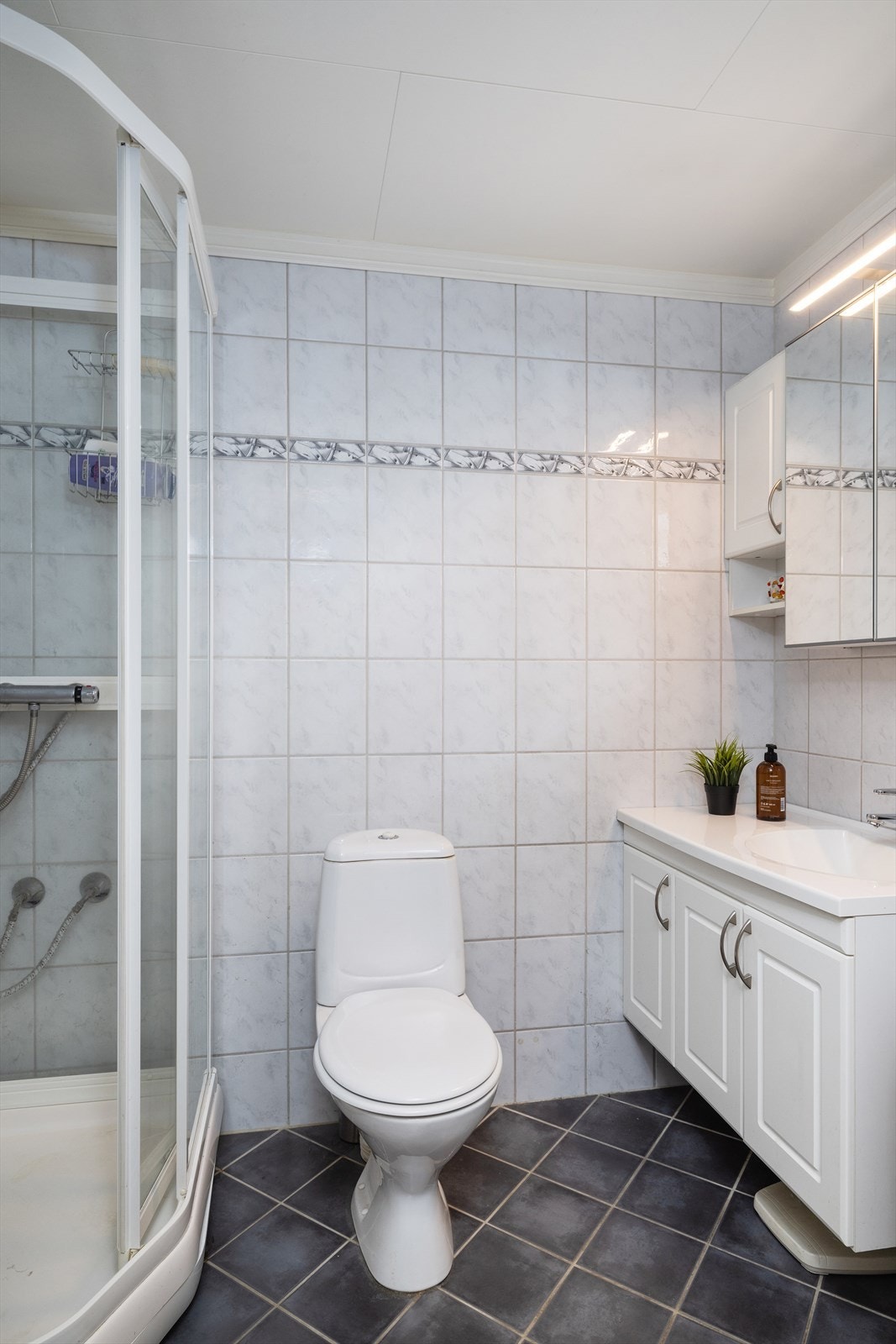 Det er også vaskemaskin på badet Galleribilde