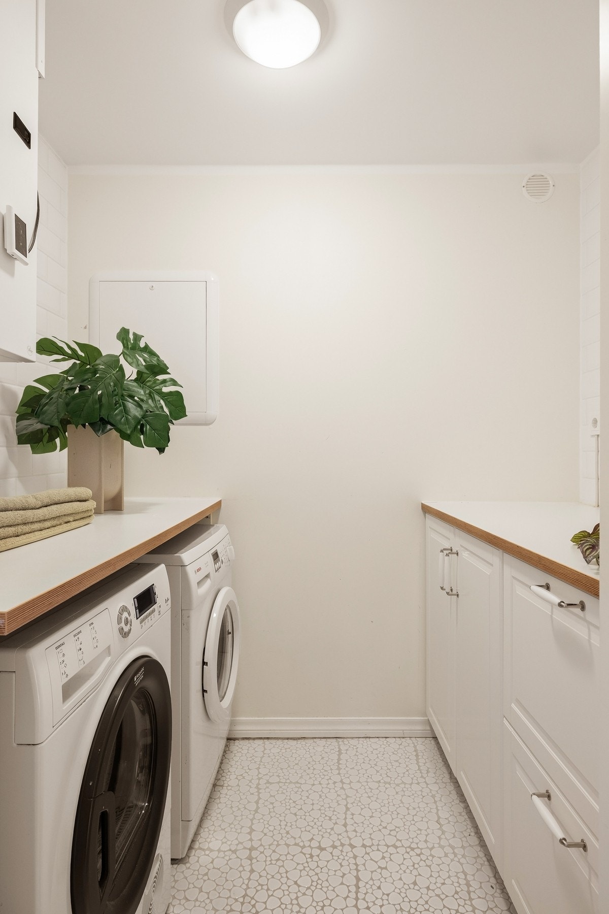 Boligen har også separat og praktisk vaskerom Galleribilde