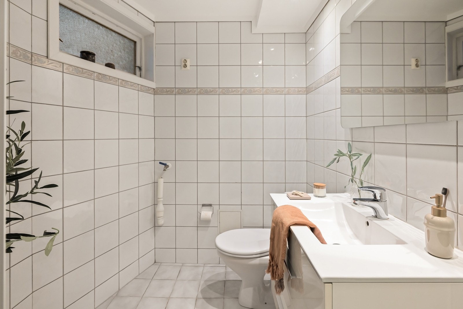 Badet er helfliset og holder en pen og tidløs standard. Galleribilde