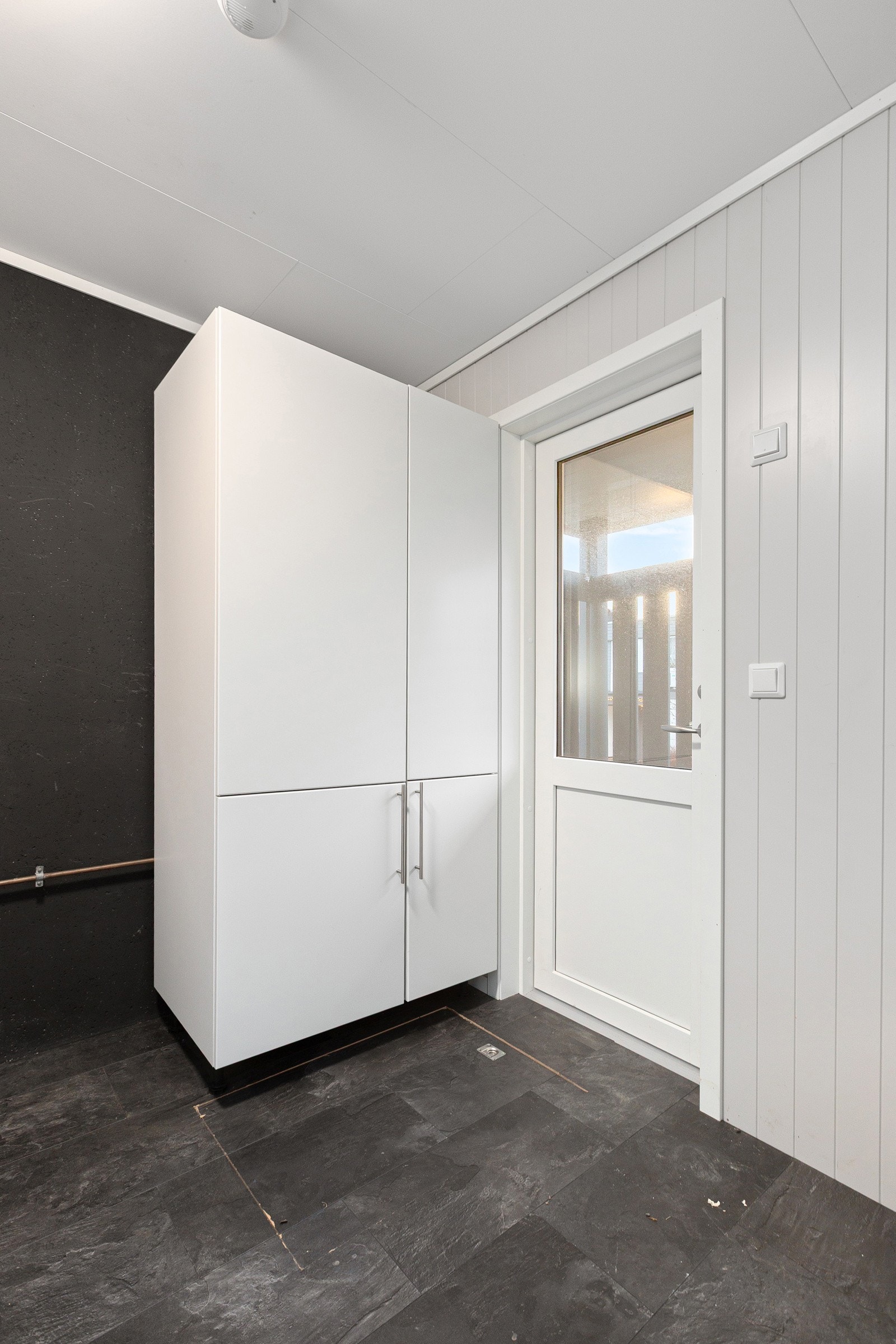 Vaskerommet har egen inngang med hovedinngangen. Galleribilde