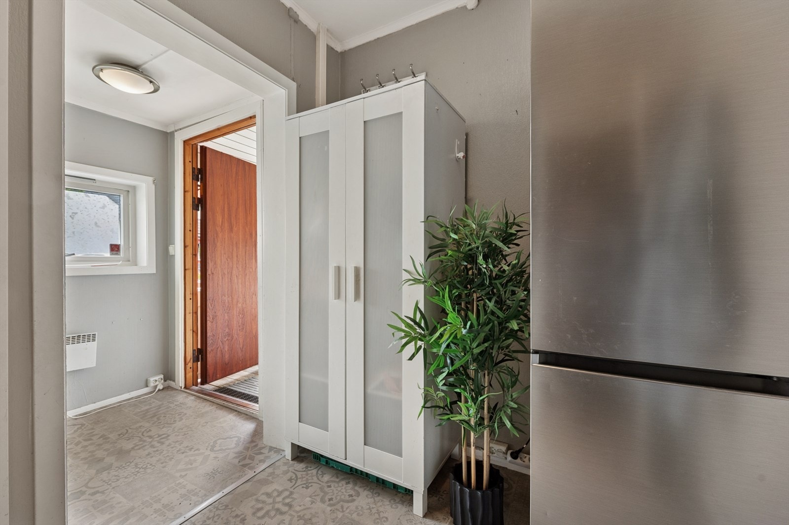 Her er det plass for å oppbevare sko og yttertøy. Galleribilde