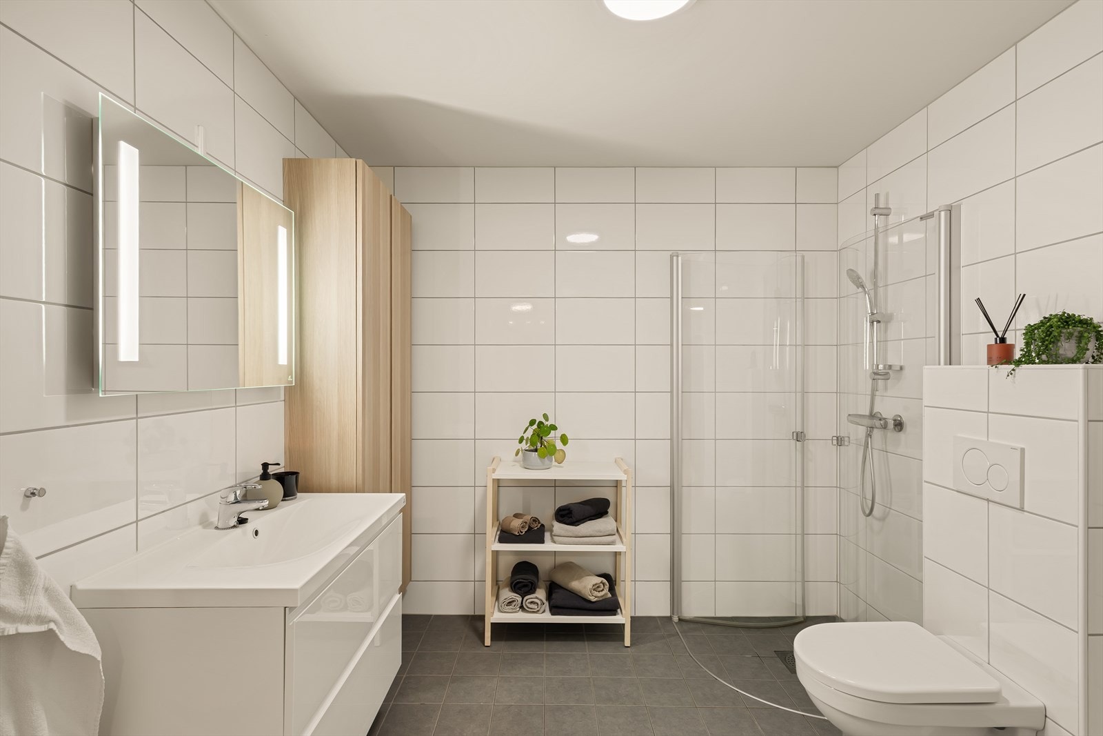 I enden av gangen ligger badet som er på 7,5 m² Galleribilde