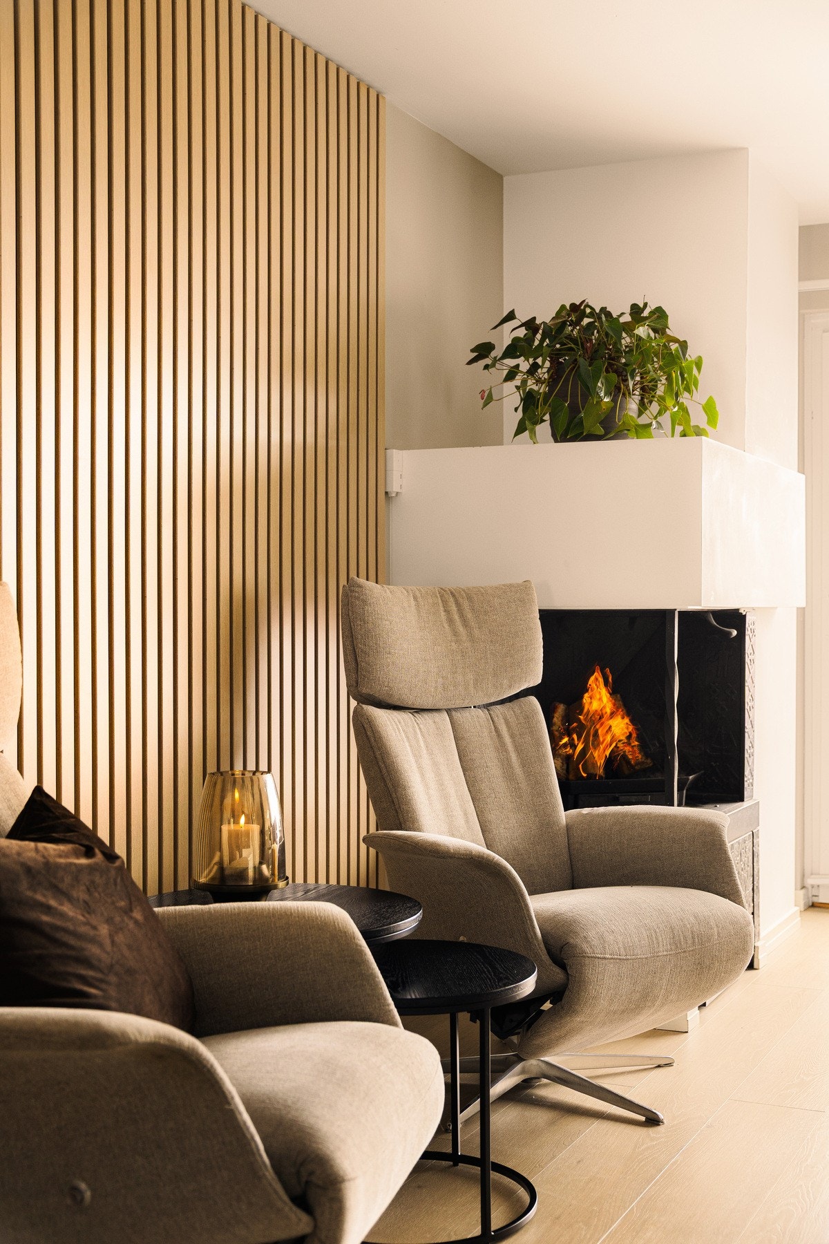 Den innbydende peisen bidrar til å skape varme og koselige stunder Galleribilde