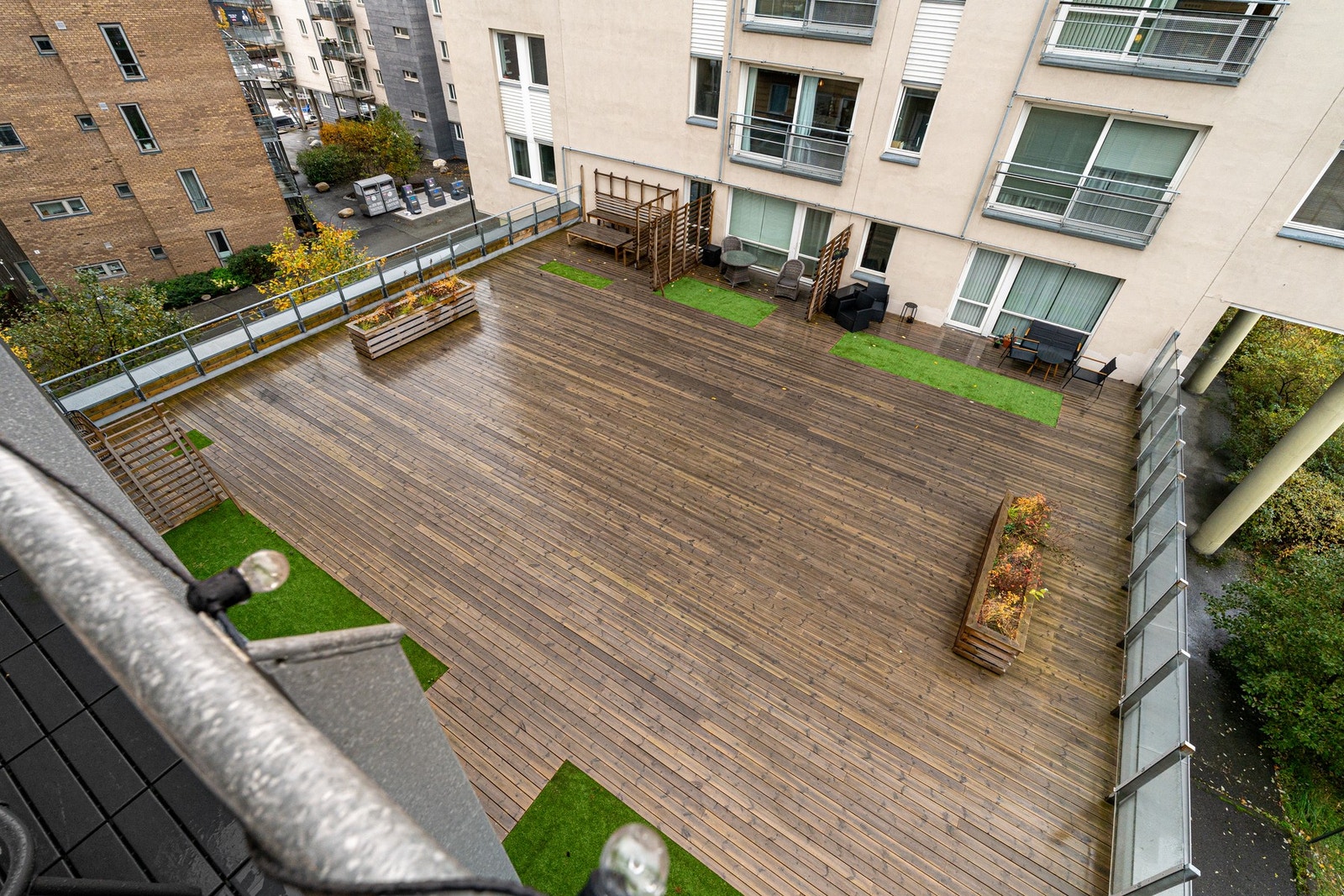 Felles markterrasse som benyttes av beboerne. Galleribilde