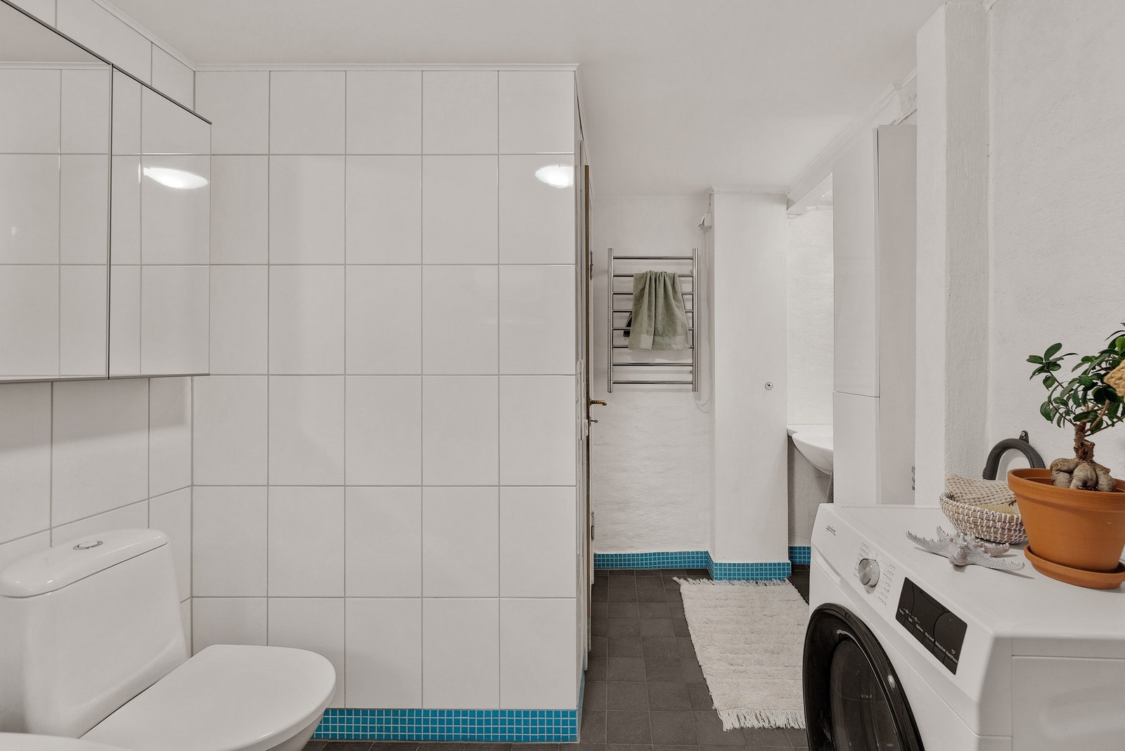 God plass til vaskemaskin på baderommet. Galleribilde