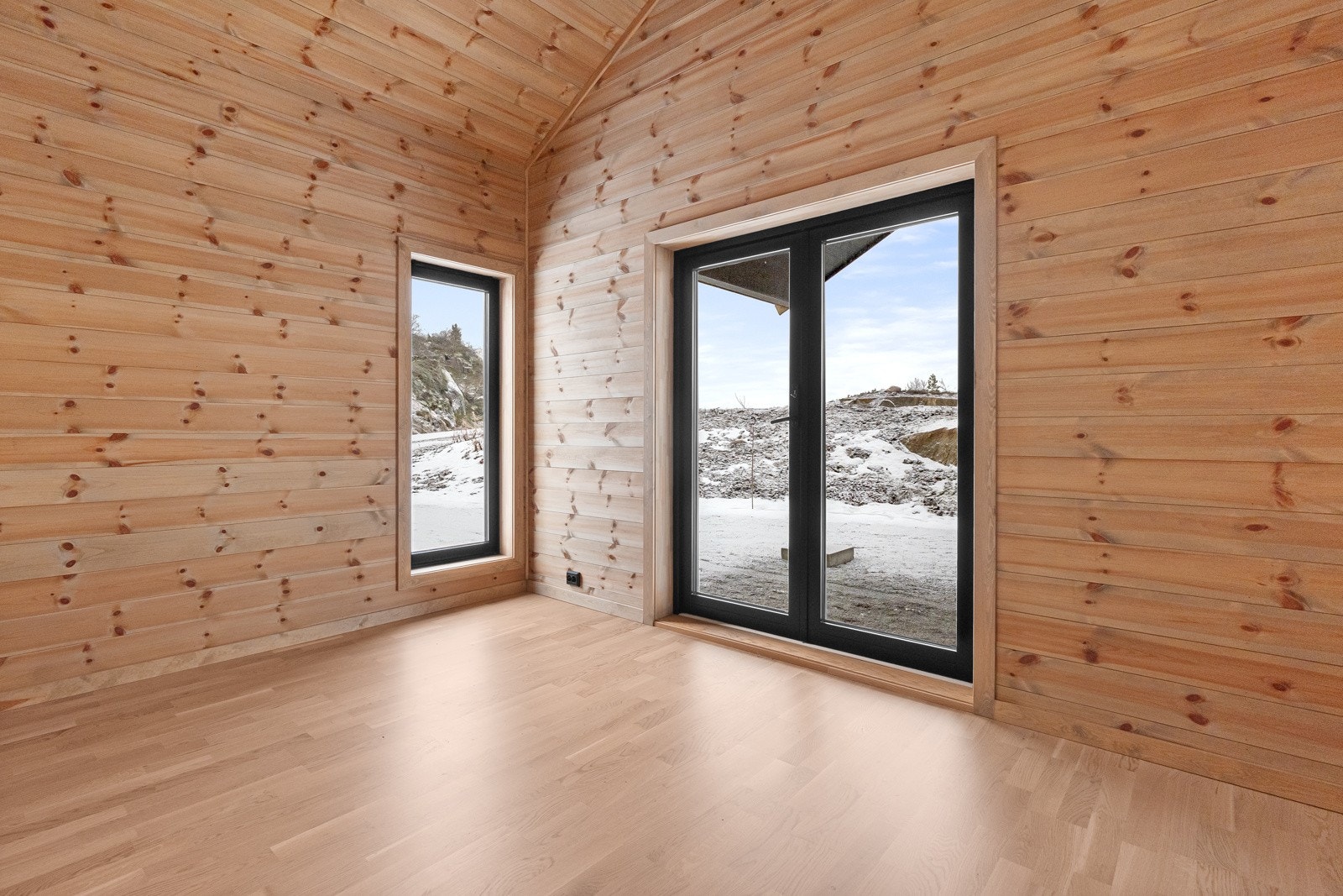 TV-stue / soverom med utgang til takoverbygd uteområdet. Galleribilde