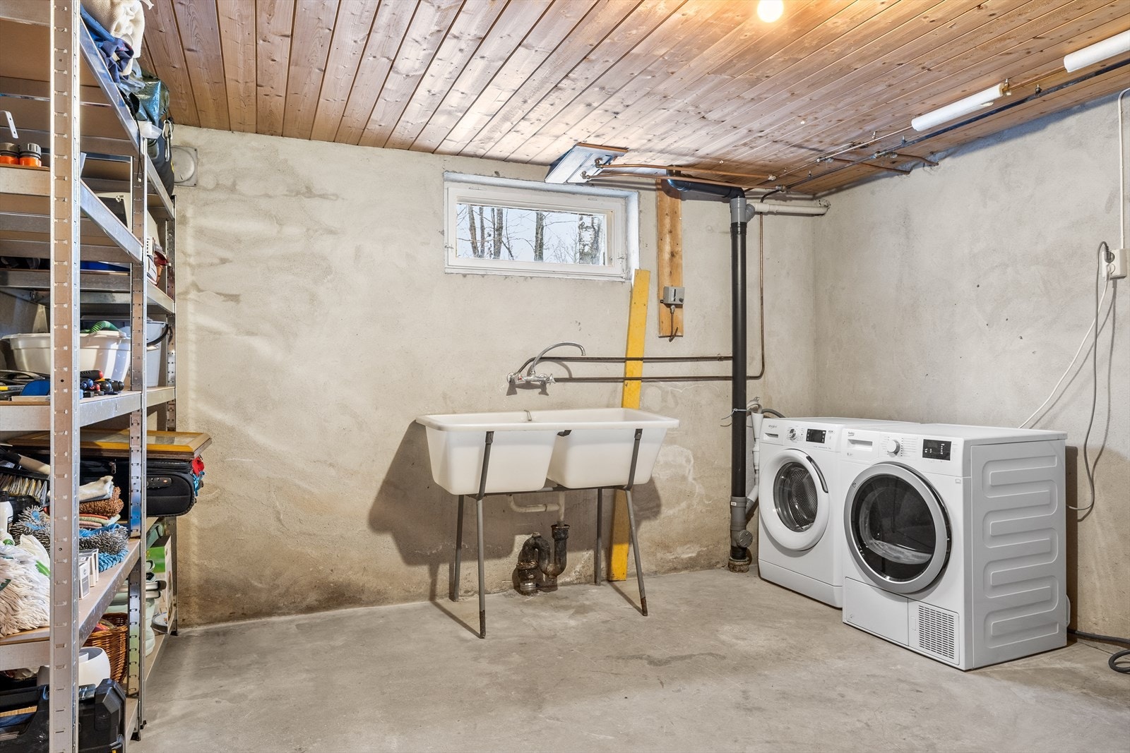 Vaskerommet har opplegg for vaskemaskin og tørketrommel. Galleribilde